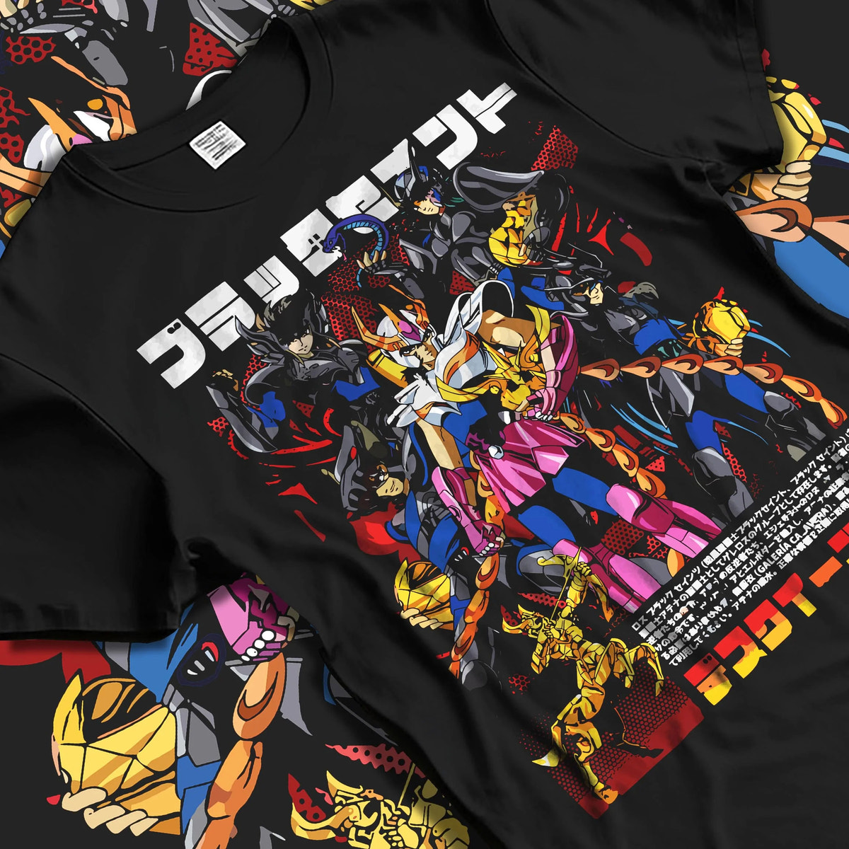 Black T-shirt laid flat with natural folds featuring Saint Seiya Bronze Saints zodiac warriors artwork.