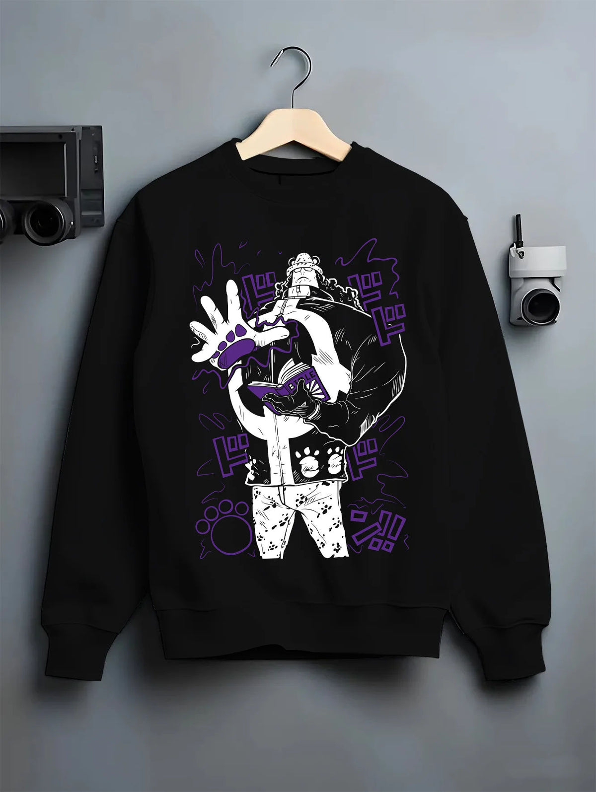 Black crewneck sweatshirt on hanger showing Bartholomew Kuma from One Piece: paw-paw fruit