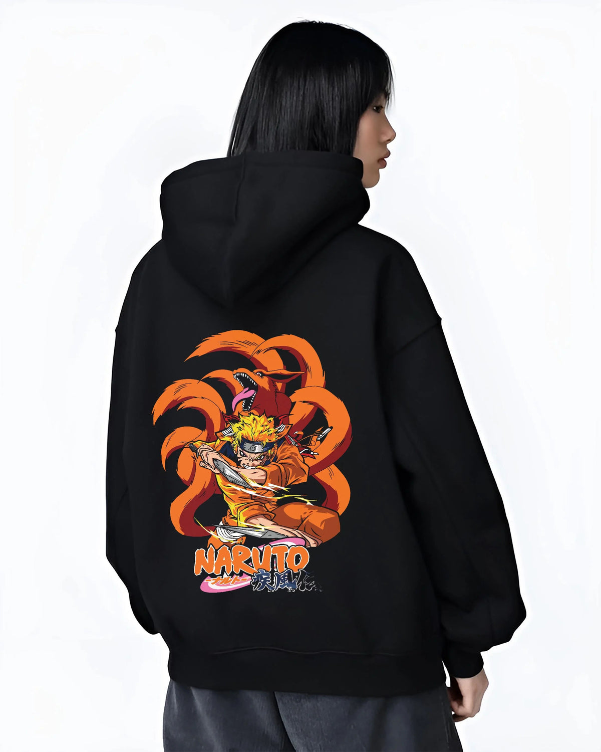 Black hoodie worn by female model from the back featuring Naruto Kurama Nine Tails chakra artwork.