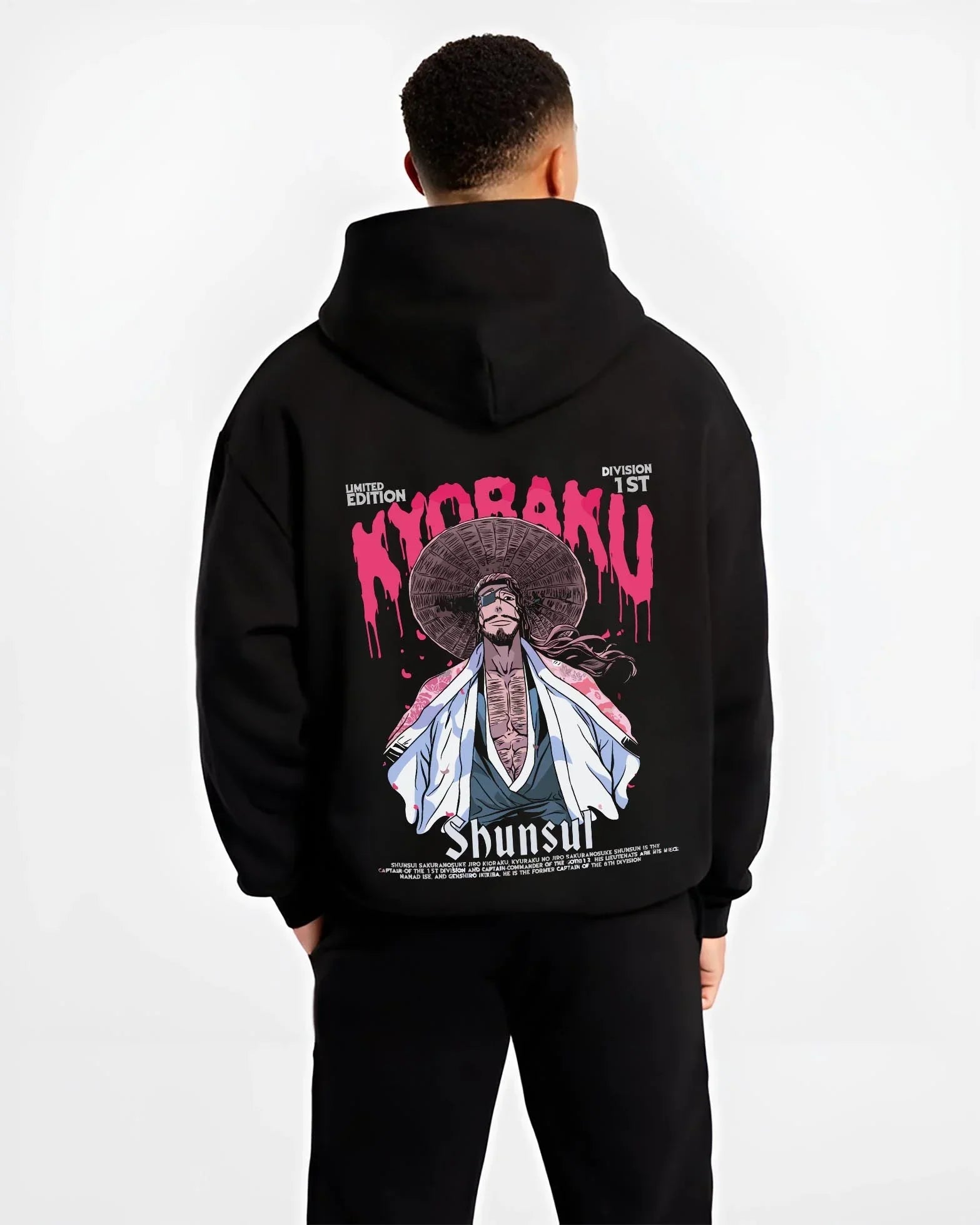 Black hoodie worn by male model, back view with Kaiju No. 8 Defense Force Team Hoodie Tactical graphic bold anime graphic.