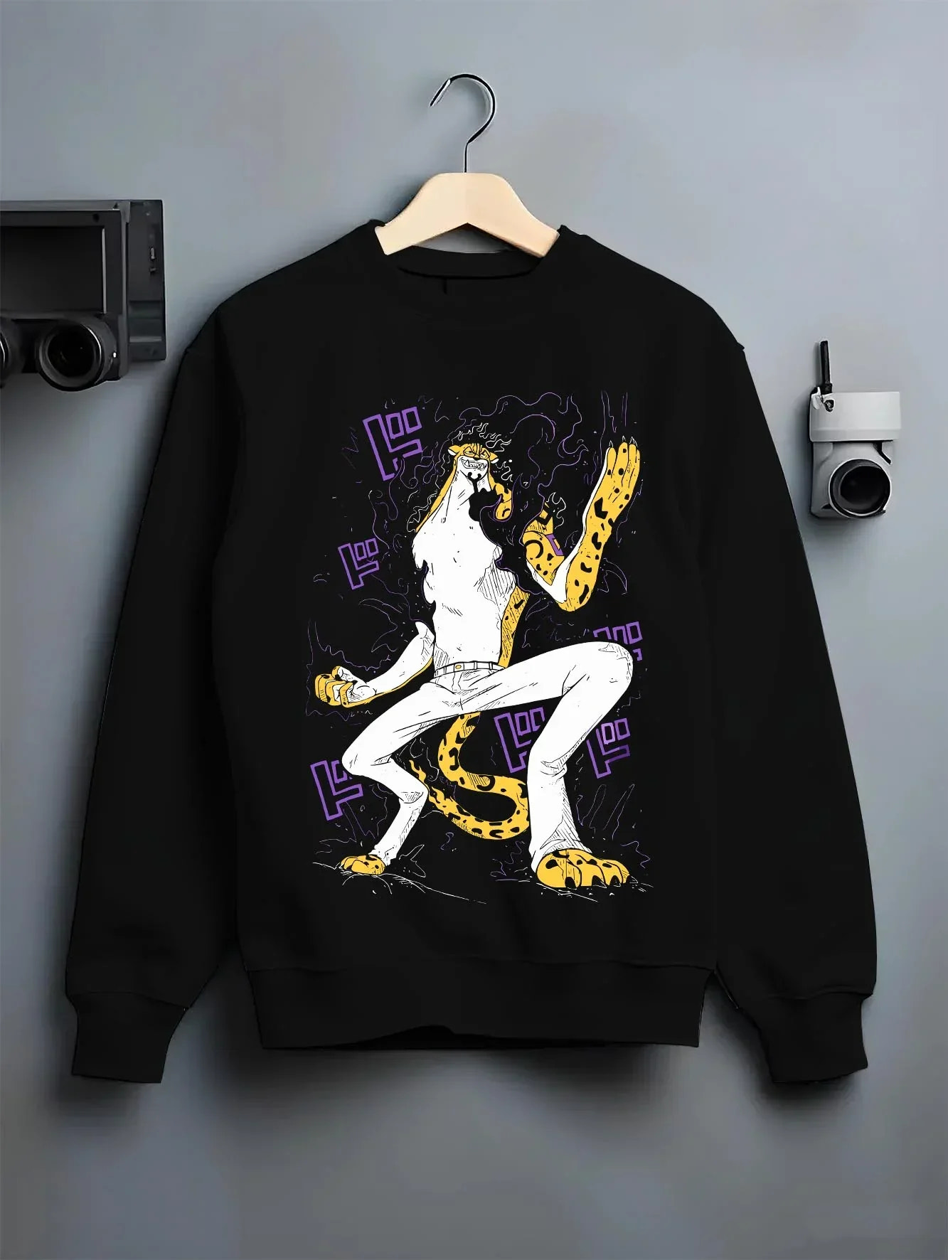 Black crewneck sweatshirt on hanger with Kaiju No. 8 Fiery Transformation Hoodie Heroic graphic streetwear graphic.