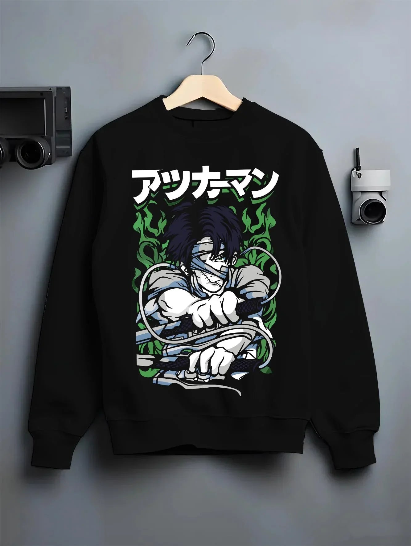 Black crewneck sweatshirt on hanger with Demon Slayer Corps Blood Clash Hoodie Intense graphic bold anime graphic.