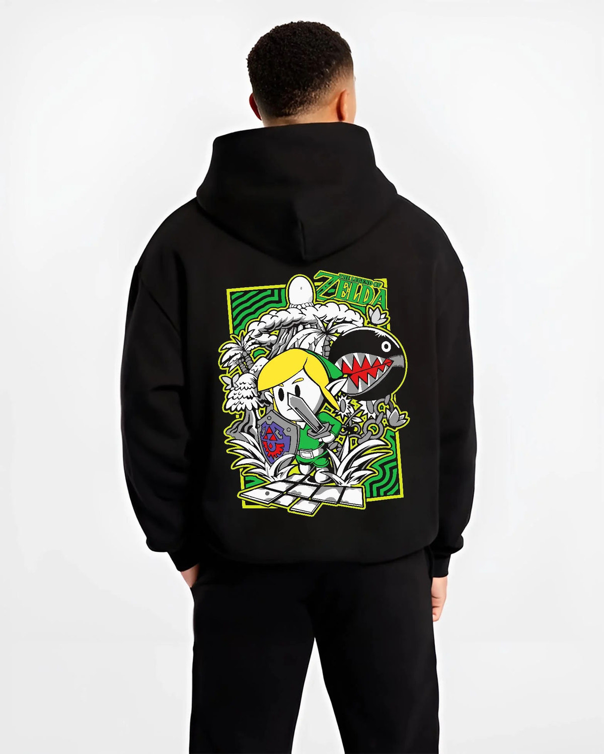 Black hoodie worn by male model from the back featuring Link with the Master Sword artwork.