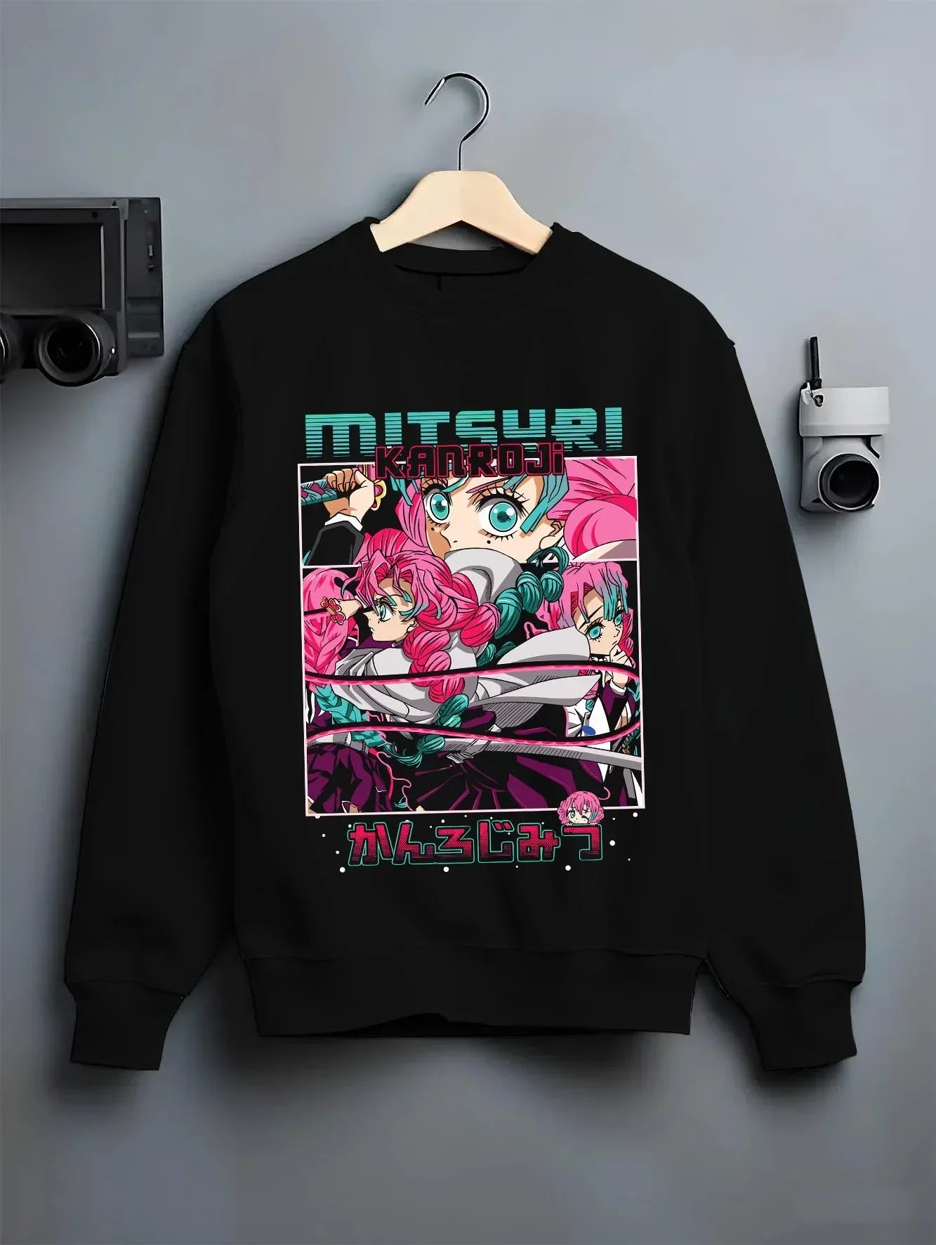 Black crewneck sweatshirt on hanger with Chainsaw Man Aki Hayakawa Hoodie Curse Contract graphic streetwear graphic.