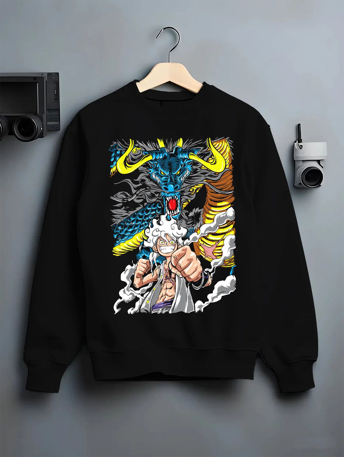 Black crewneck sweatshirt on hanger with Monkey D. Luffy Gear 5 with Kaido dragon from One Piece illustrated back graphic