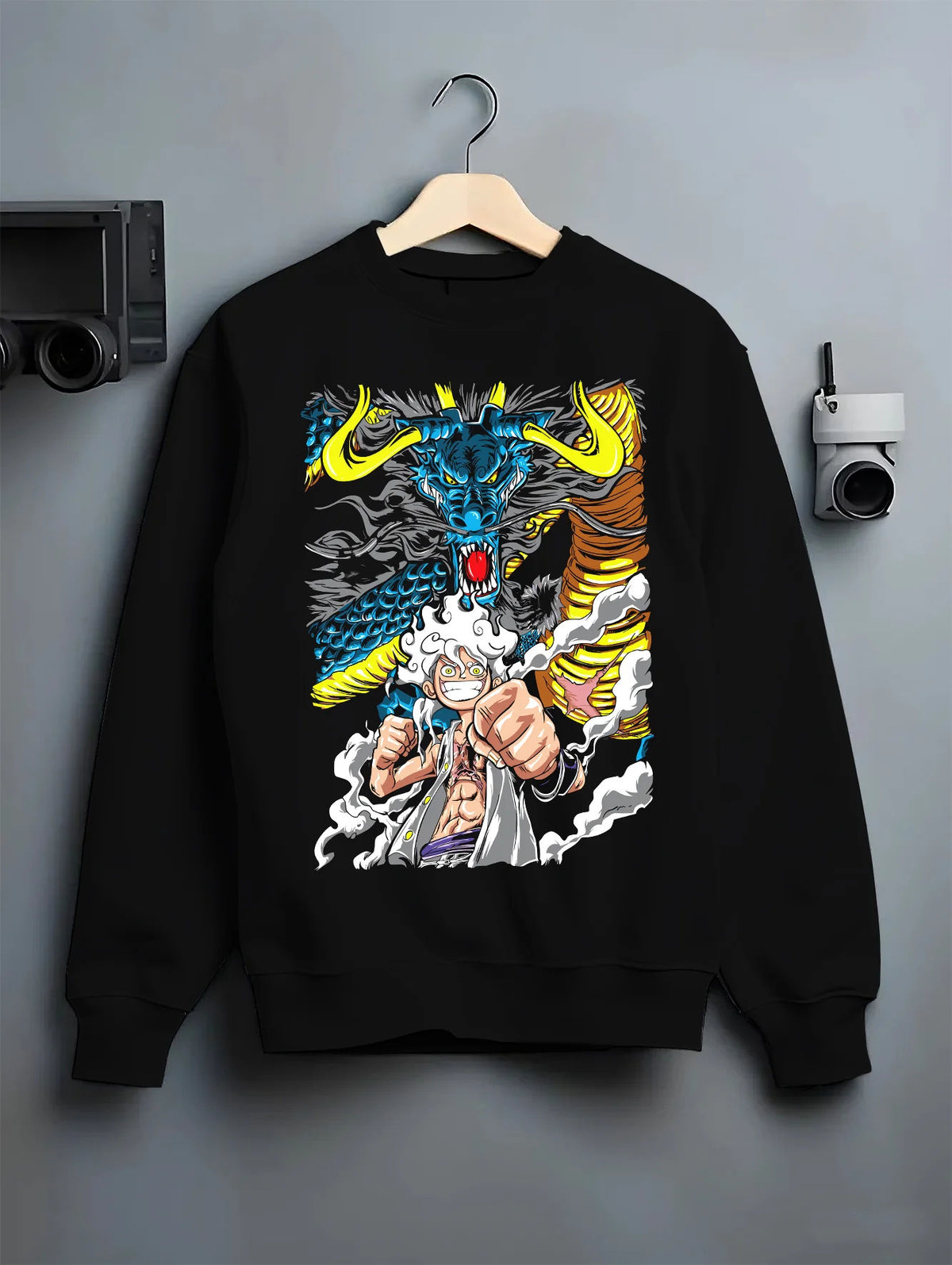 Black crewneck sweatshirt on hanger with Monkey D. Luffy Gear 5 with Kaido dragon from One Piece illustrated back graphic