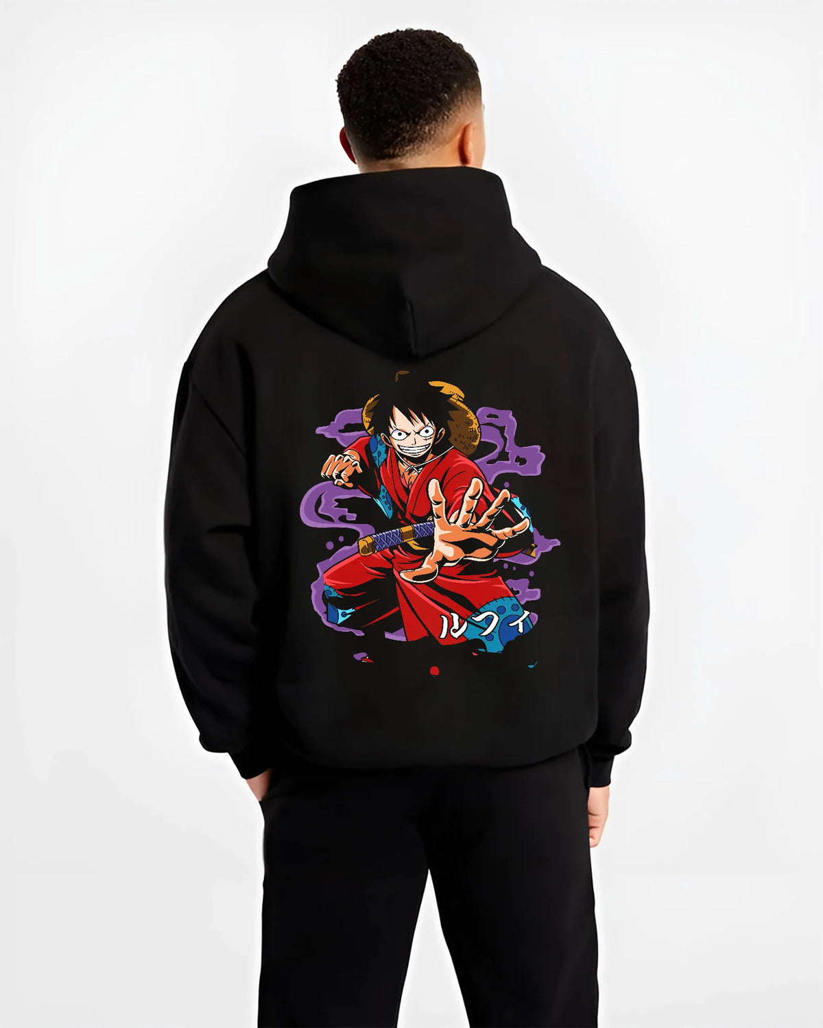 Black hoodie model back view showing Monkey D. Luffy from One Piece: red coat battle pose