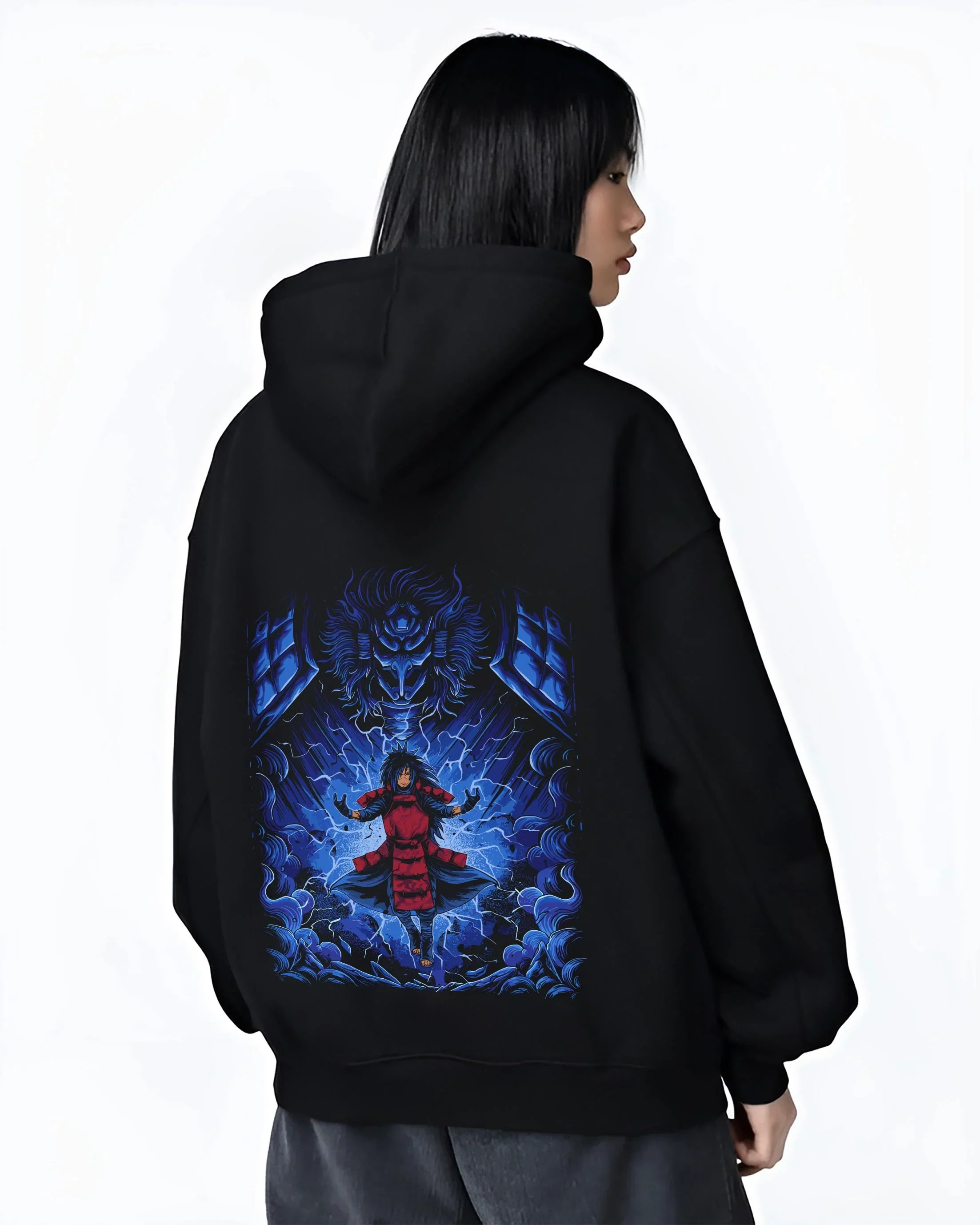 Black hoodie worn by female model, back view with Madara Uchiha Hoodie Naruto Legendary Power graphic streetwear graphic.