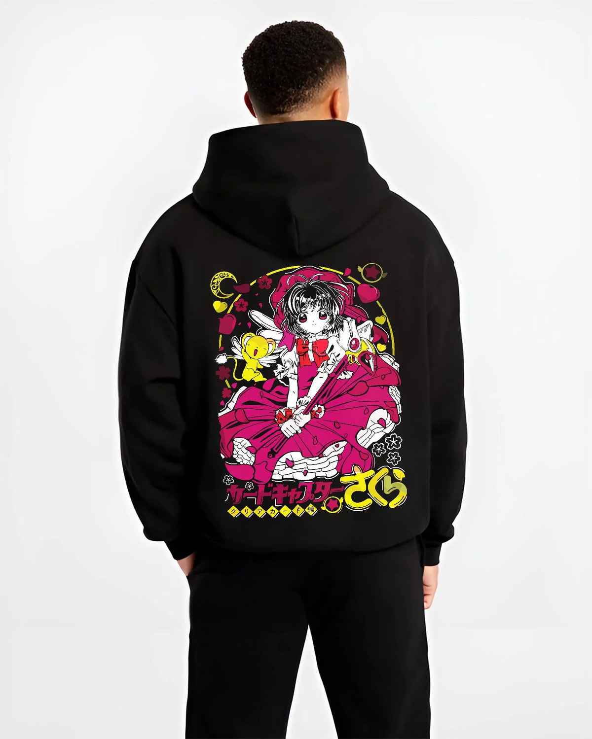 Black hoodie worn by male model from the back featuring Sakura Kinomoto with her magic wand artwork.