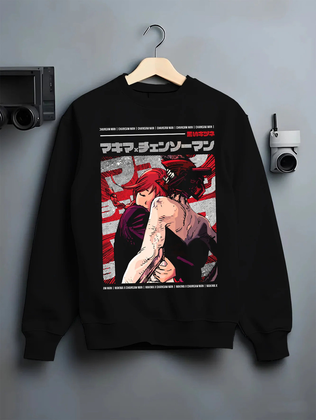 Black crewneck sweatshirt on hanger showing Makima and Denji from Chainsaw Man: Chainsaw Man crimson poster