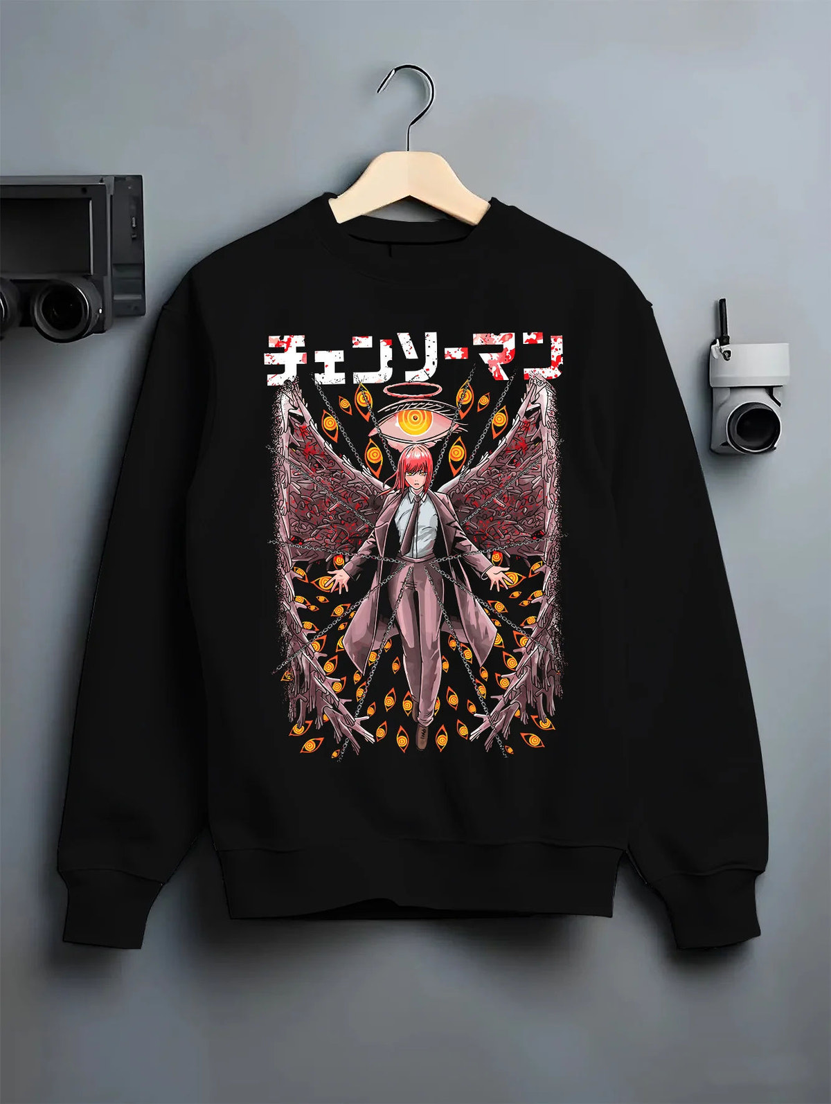 Black crewneck sweatshirt on hanger showing Makima from Chainsaw Man: Control Devil with chains