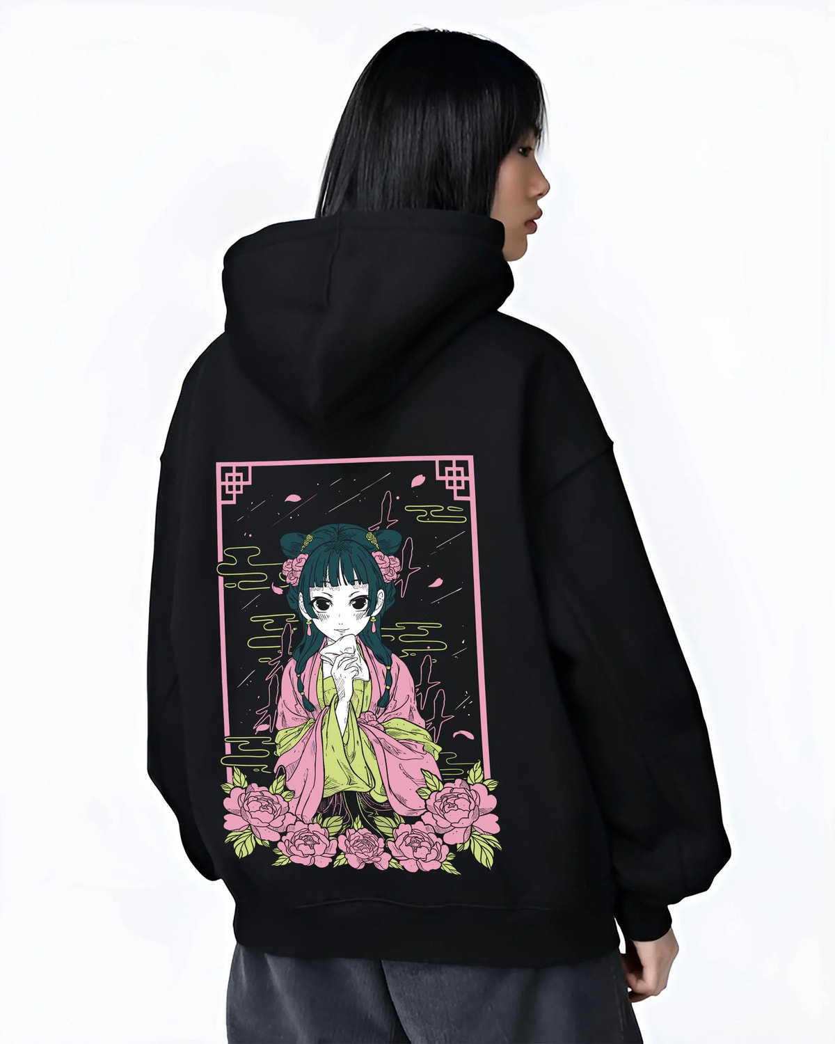 Black hoodie worn by female model from the back featuring Maomao floral herbalist portrait artwork.