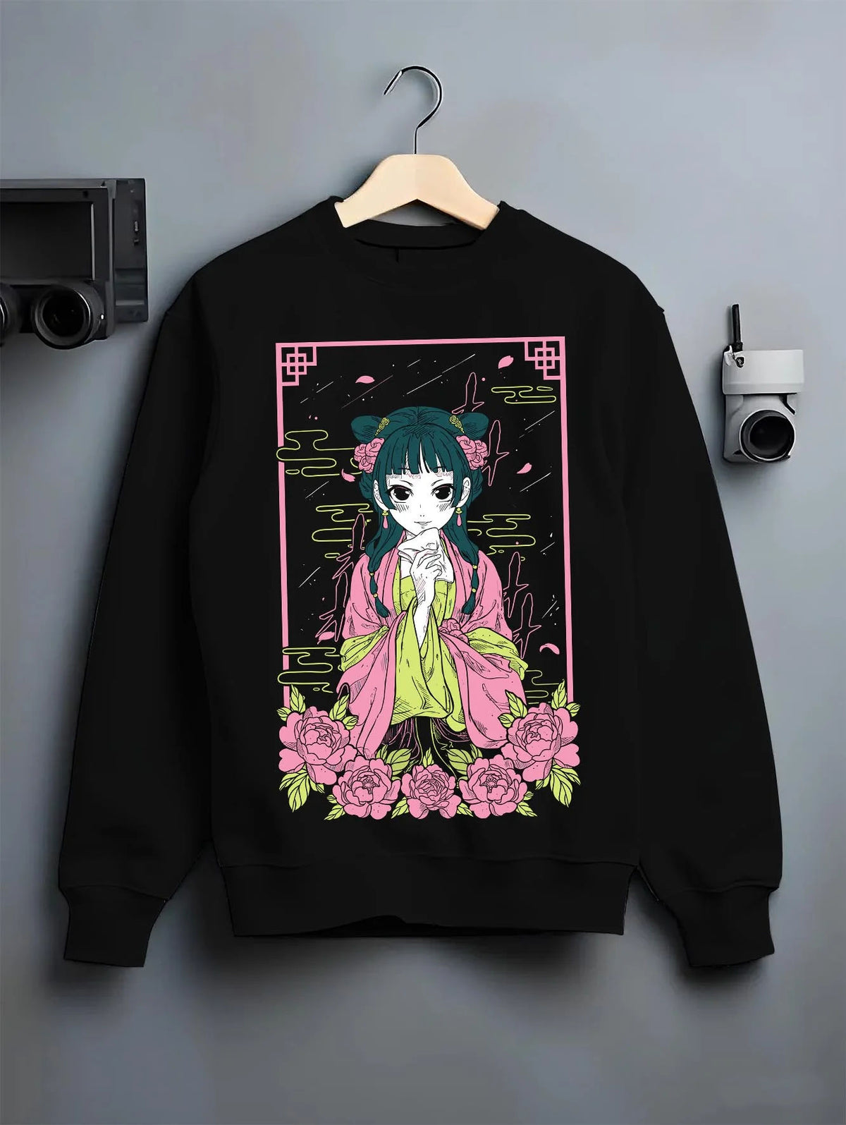 Black crewneck sweatshirt on hanger featuring Maomao floral herbalist portrait artwork.