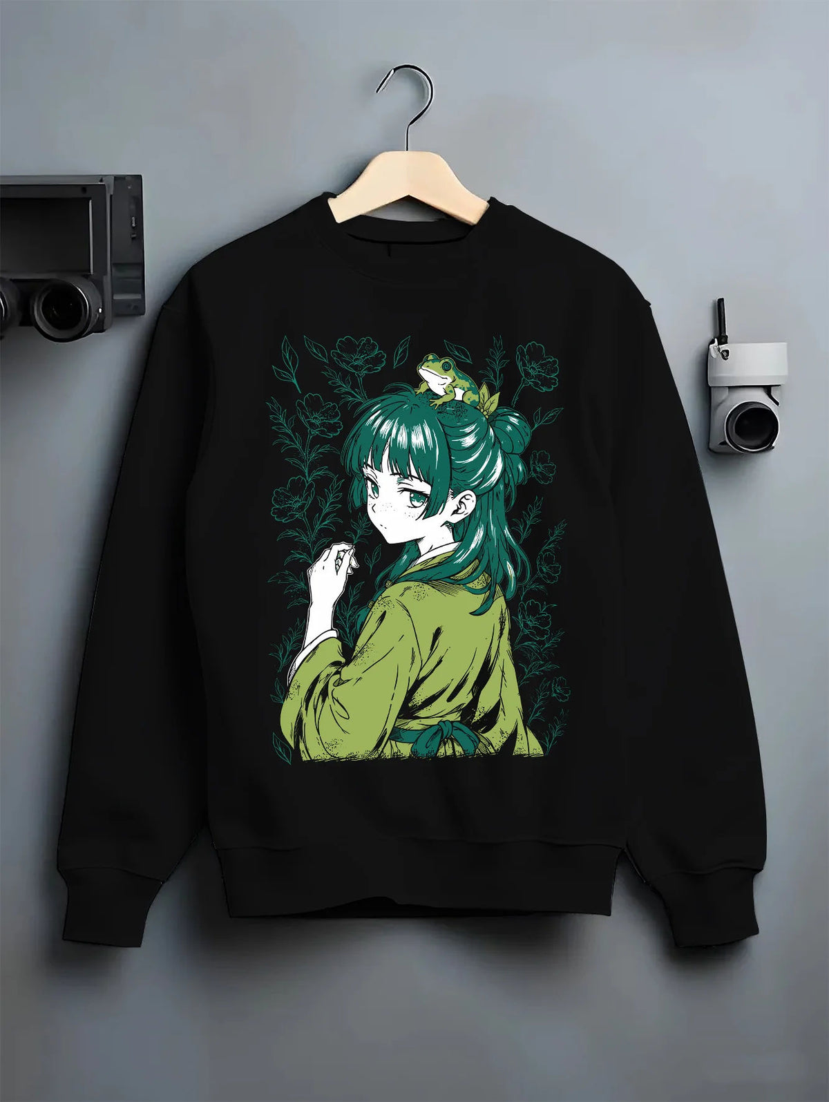 Black crewneck sweatshirt on hanger showing Maomao from The Apothecary Diaries: Apothecary Diaries green-haired portrait