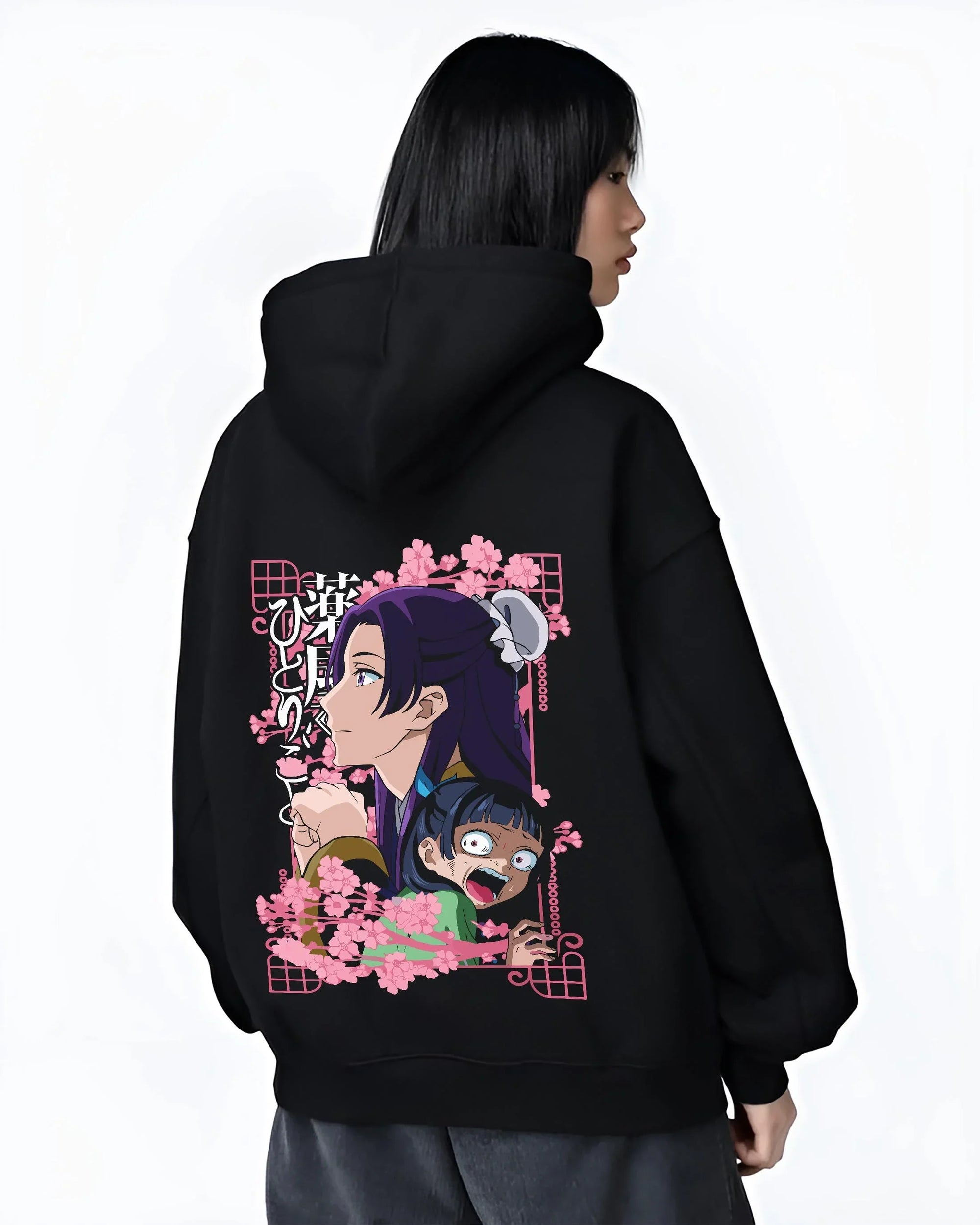 Black hoodie worn by female model, back view with Maomao Hoodie Apothecary Diaries Poison Tester Maid graphic premium wear.
