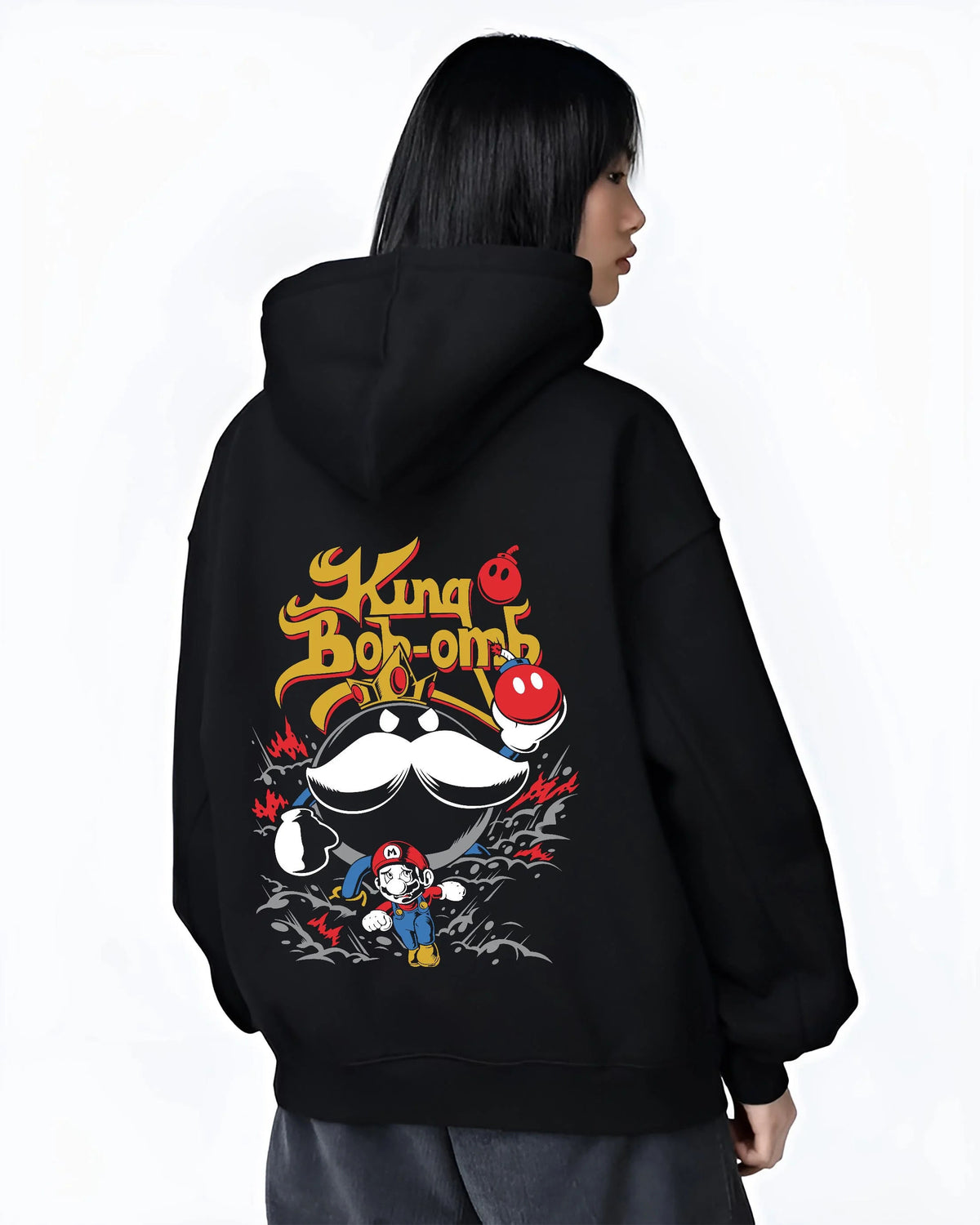 Black hoodie worn by female model from the back featuring Mario and King Bob-omb artwork.