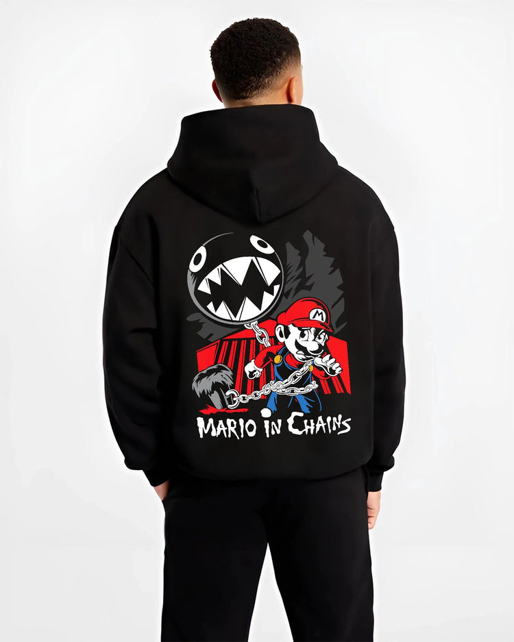 Black hoodie worn by male model from the back featuring Mario and Chain Chomp artwork.