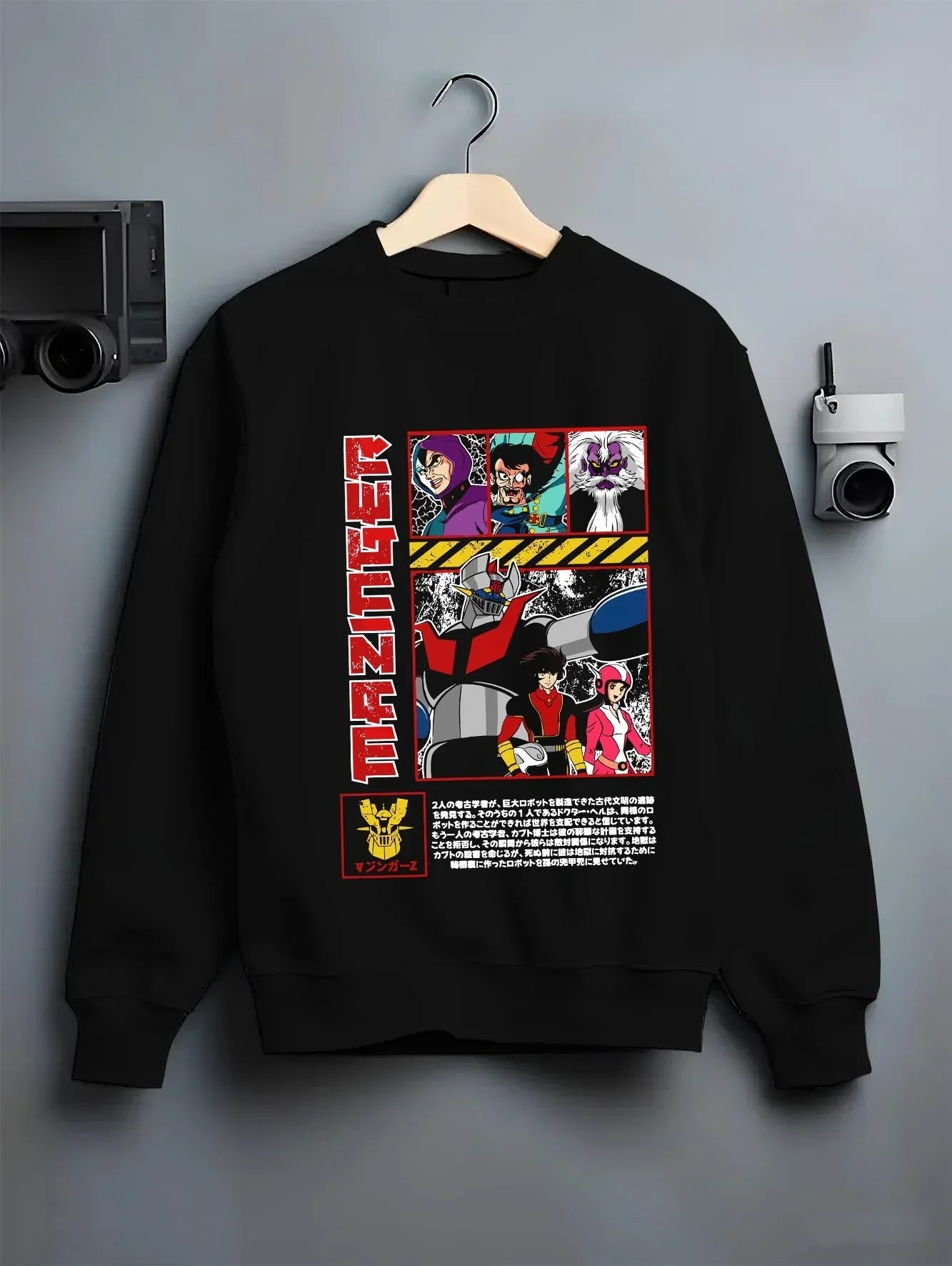 Black crewneck sweatshirt on hanger with Mazinger Z Robot Hoodie Mecha Anime Classic graphic premium wear.