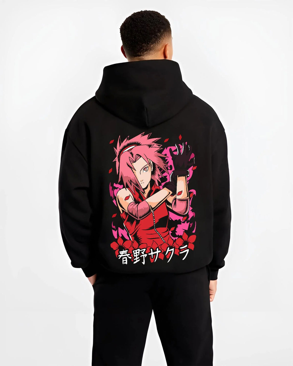 Black hoodie worn by male model from the back featuring Sakura Haruno medical ninja strength artwork.