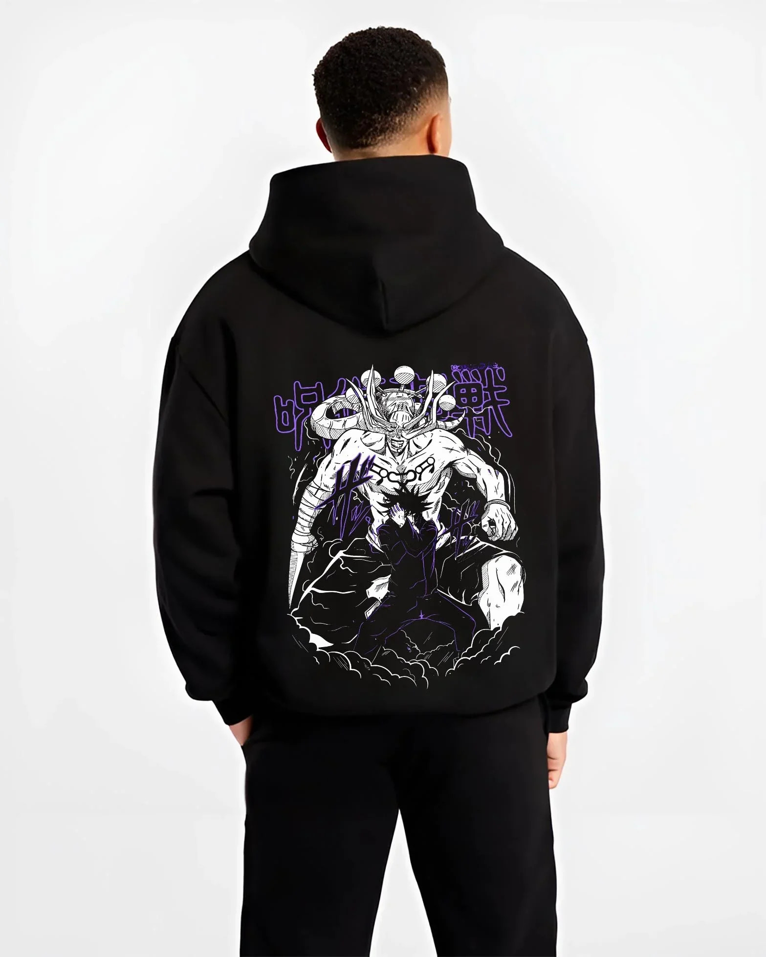 Black hoodie worn by male model, back view, showing retro manga graphic design of Mahoraga and Megumi in summoning pose.