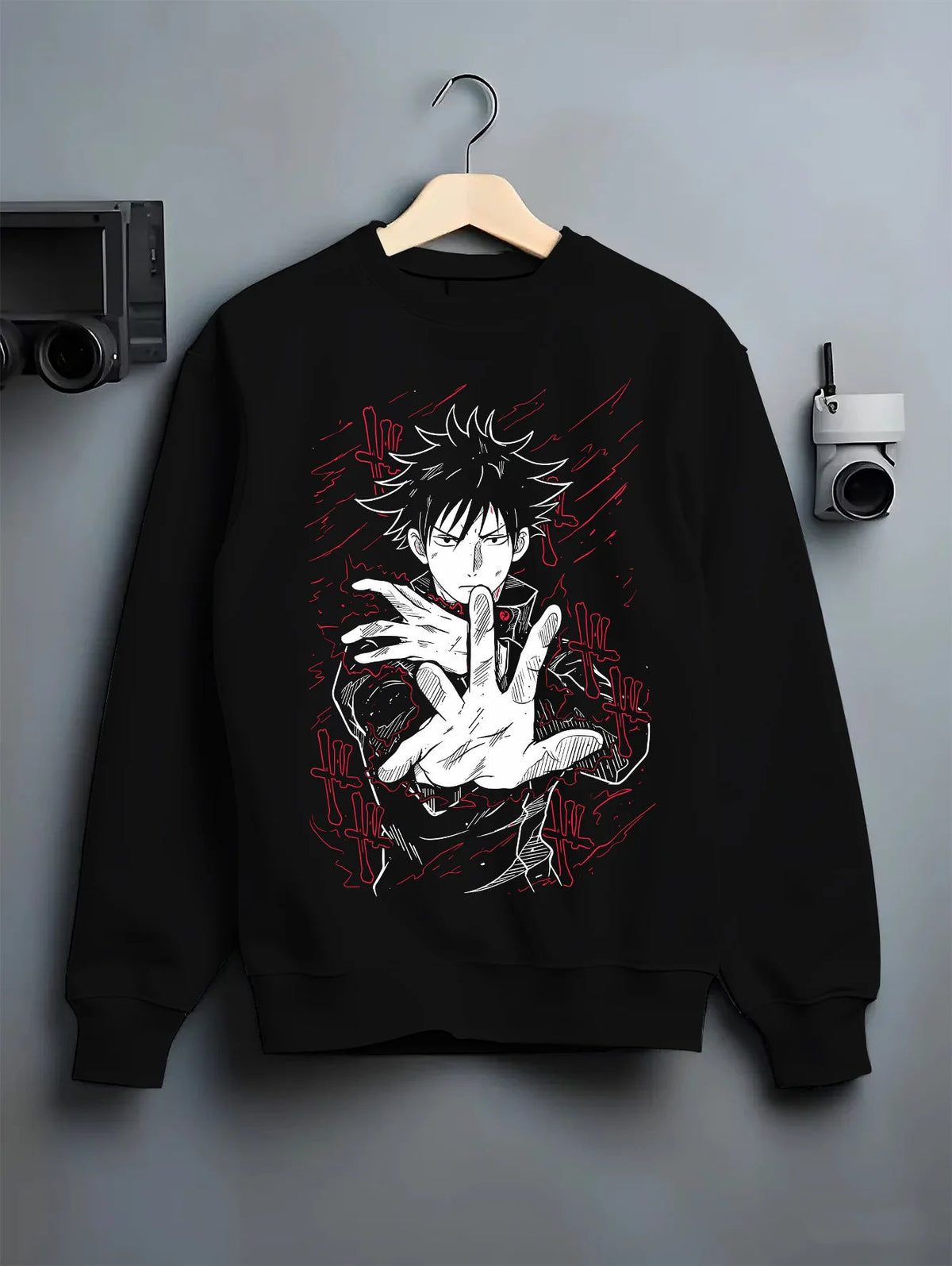 Black crewneck sweatshirt on hanger showing Megumi Fushiguro from Jujutsu Kaisen: Ten Shadows hand sign
