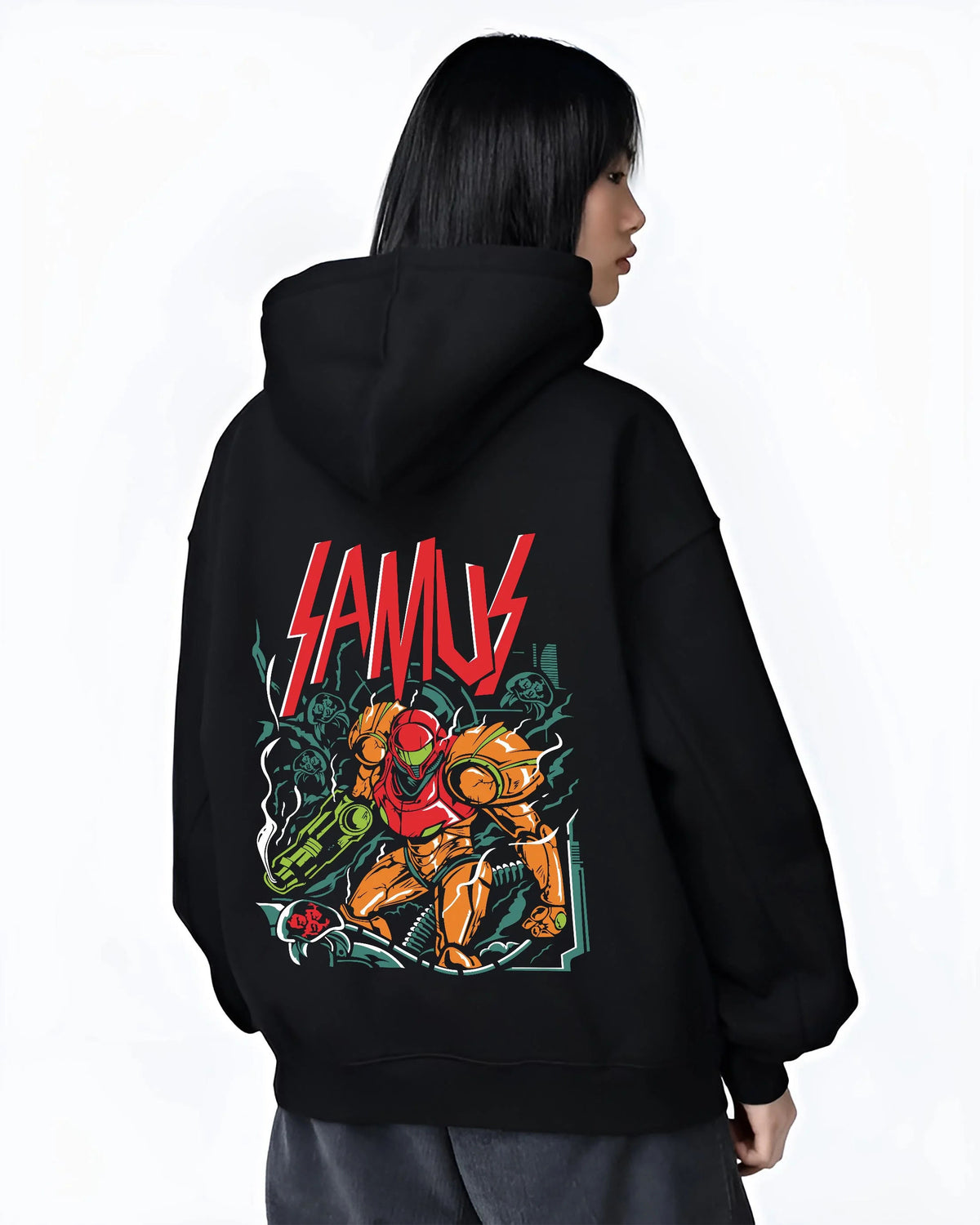 Black hoodie worn by female model from the back featuring Samus Aran in the Power Suit artwork.