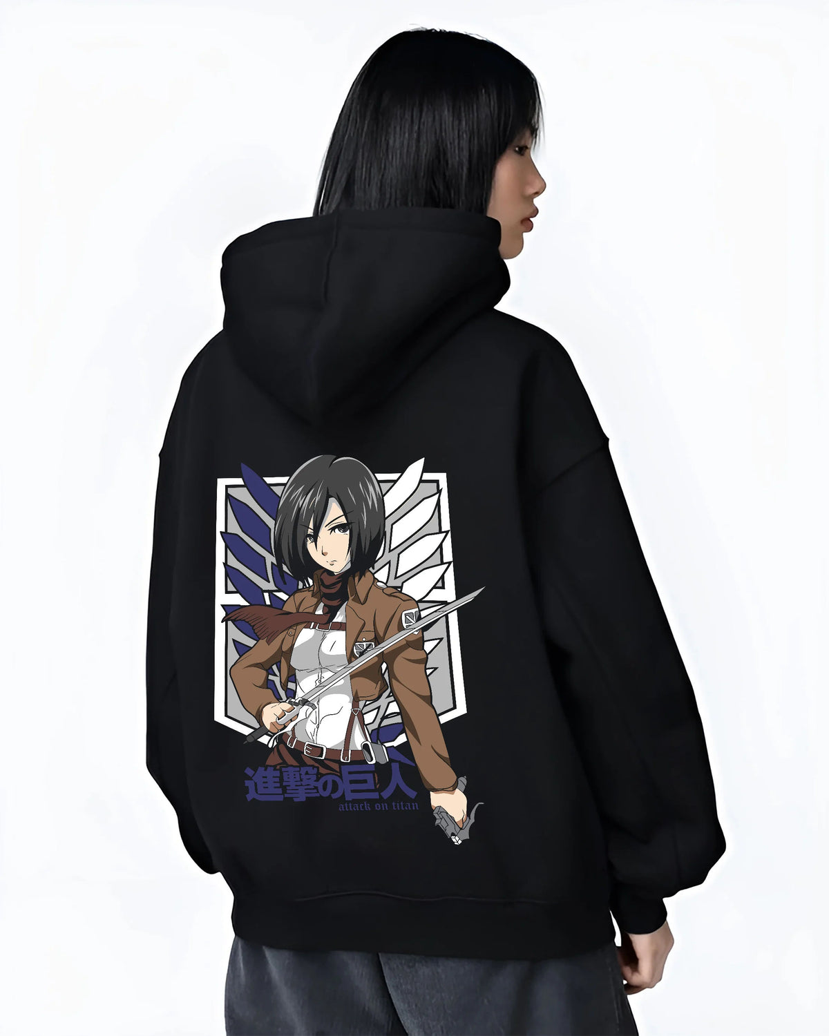 Black hoodie female model back view showing Mikasa Ackerman from Attack on Titan: Survey Corps swords