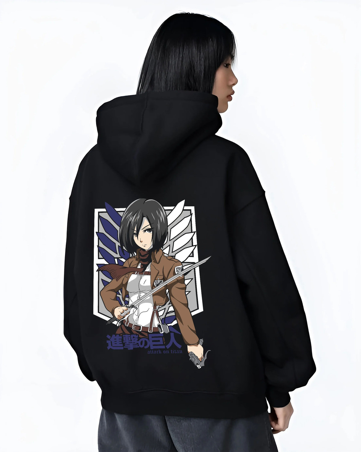 Black hoodie female model back view showing Mikasa Ackerman from Attack on Titan: Survey Corps swords