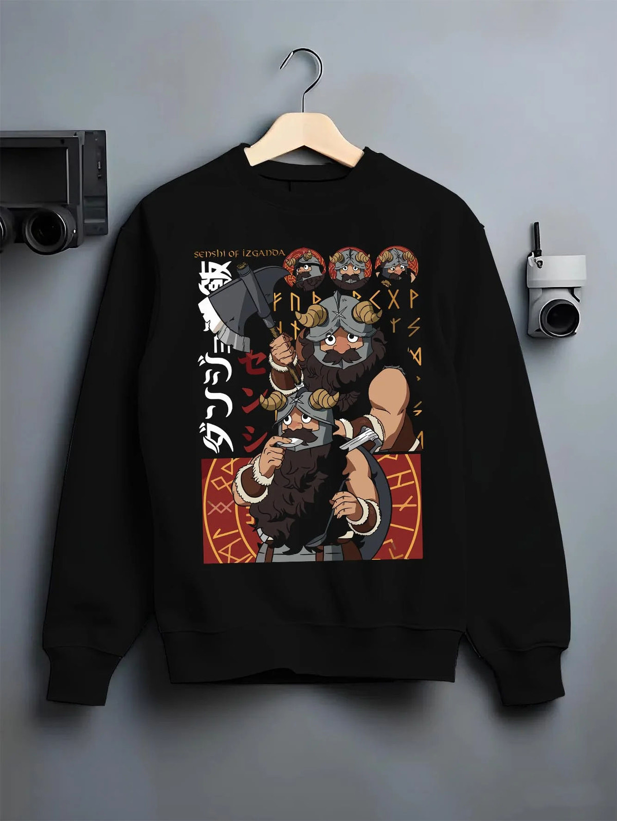 Black crewneck sweatshirt on hanger featuring Senshi the dwarf cook artwork.