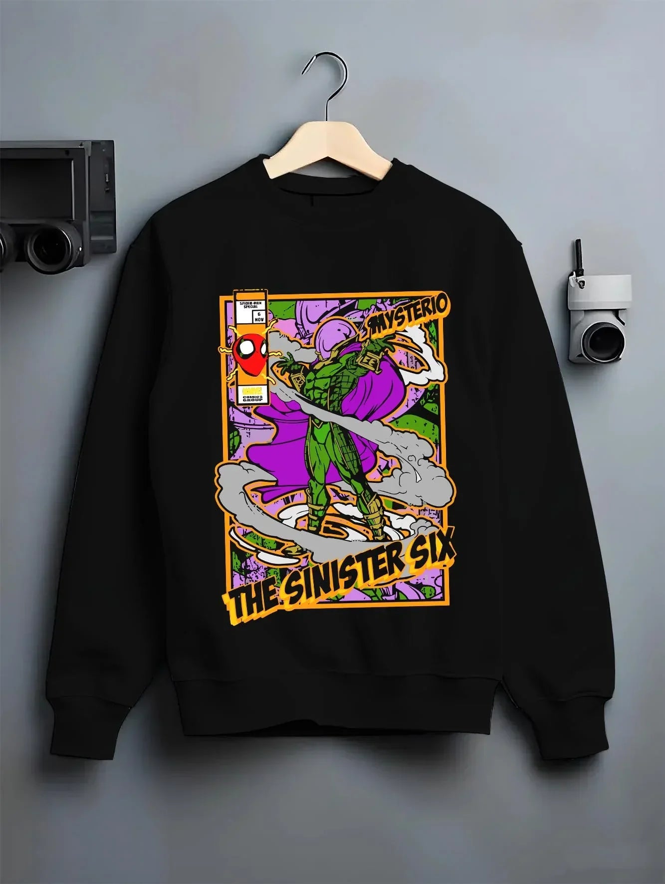 Black crewneck sweatshirt on hanger with Mysterio Hoodie Marvel Sinister Six Villain graphic premium wear.