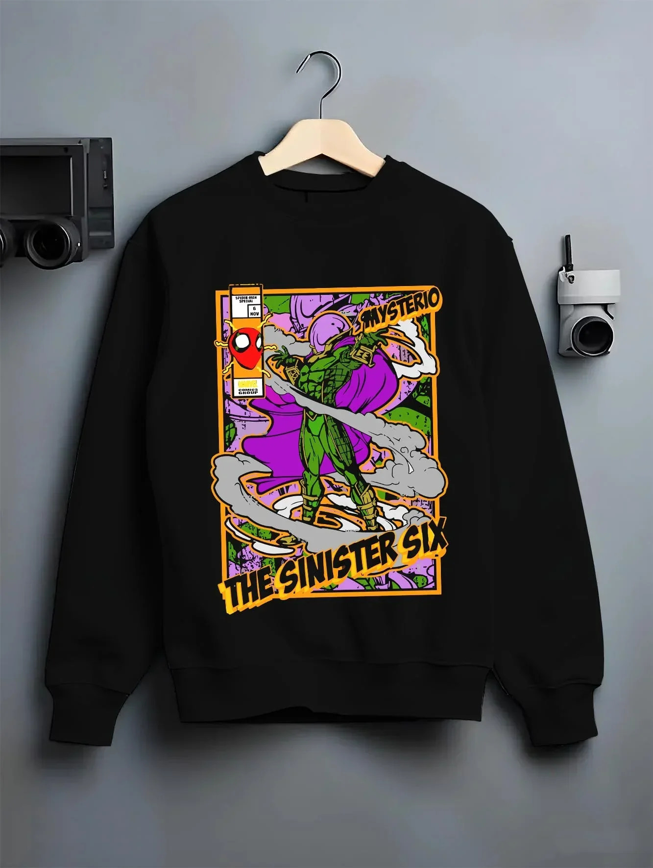 Black crewneck sweatshirt on hanger with Mysterio Hoodie Marvel Sinister Six Villain graphic premium wear.