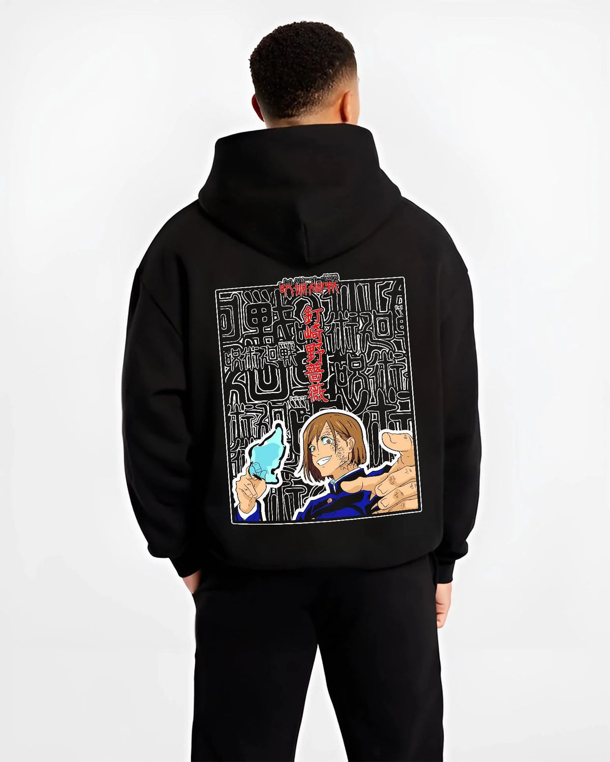 Black hoodie worn by male model from the back featuring Nobara Kugisaki Straw Doll Technique artwork.