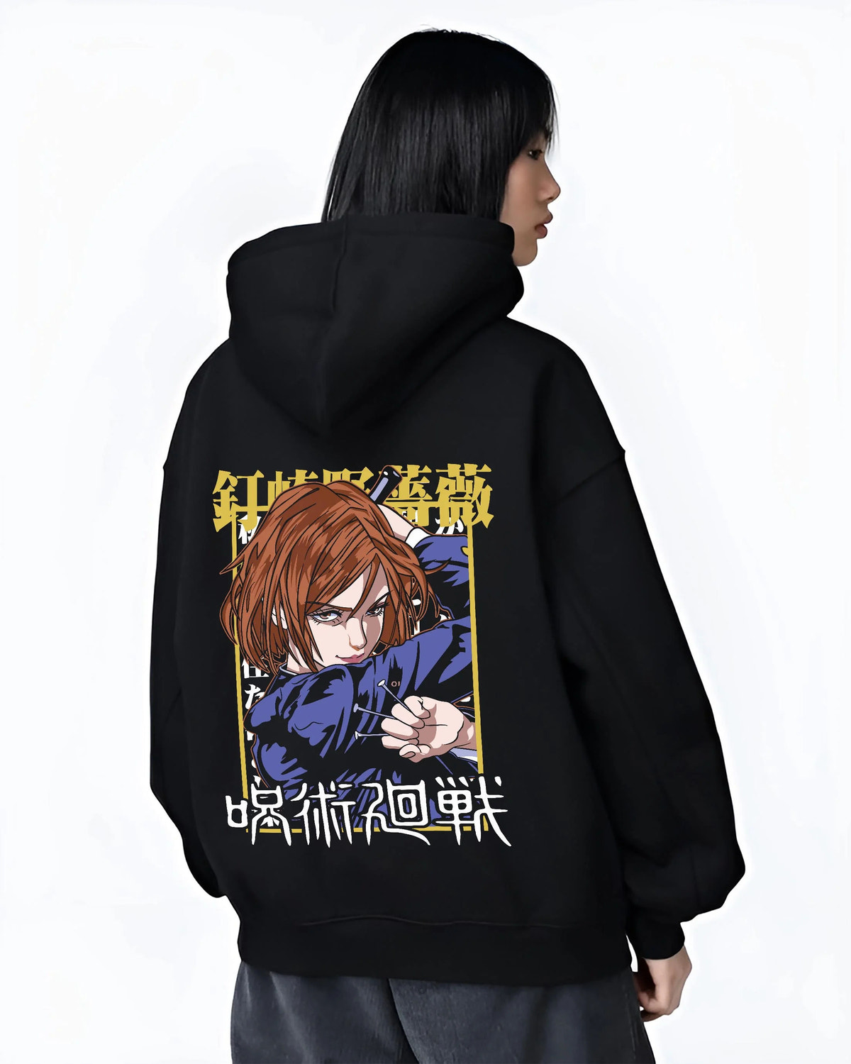 Black hoodie worn by female model from the back featuring Nobara Kugisaki hammer and nails artwork.