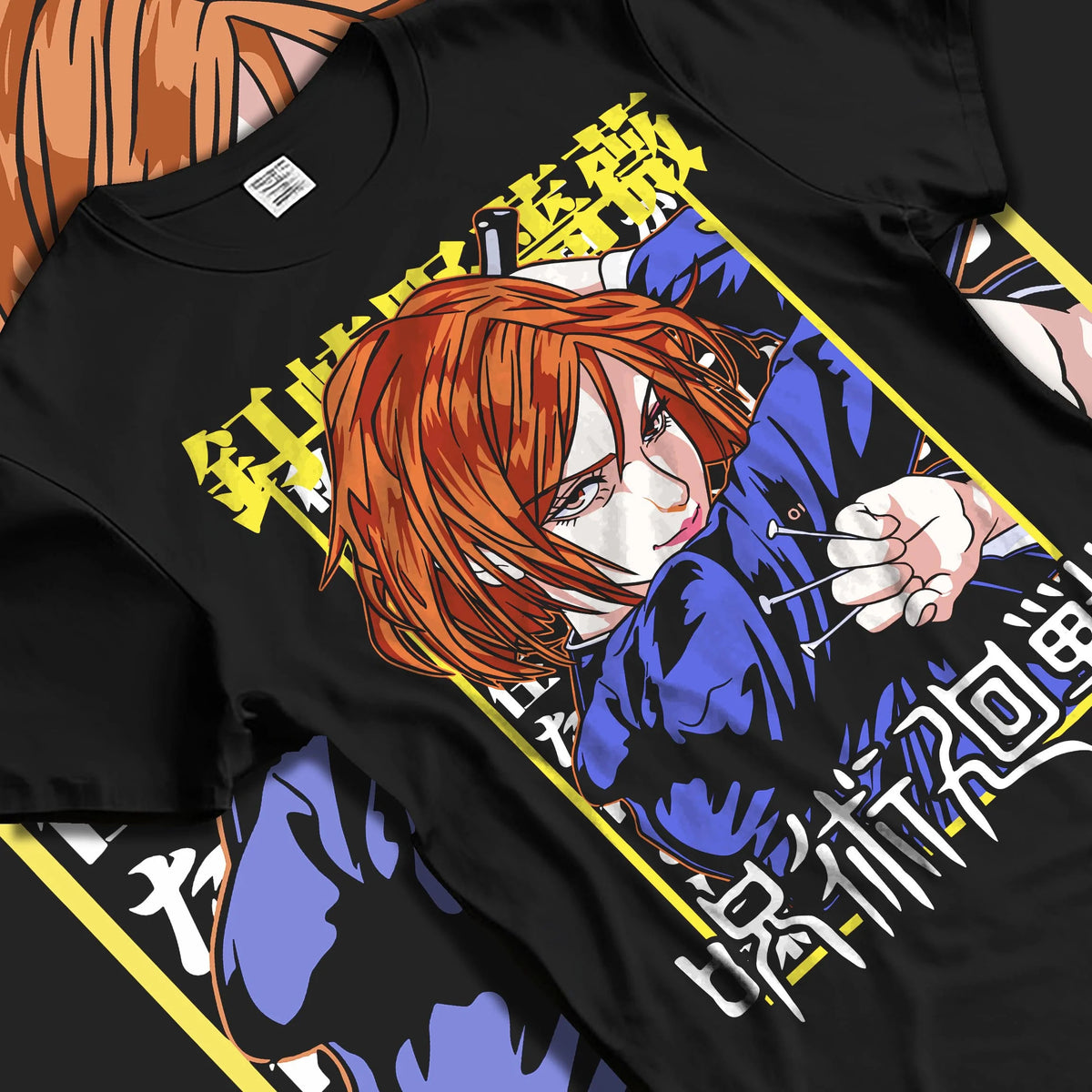 Black T-shirt laid flat with natural folds featuring Nobara Kugisaki hammer and nails artwork.