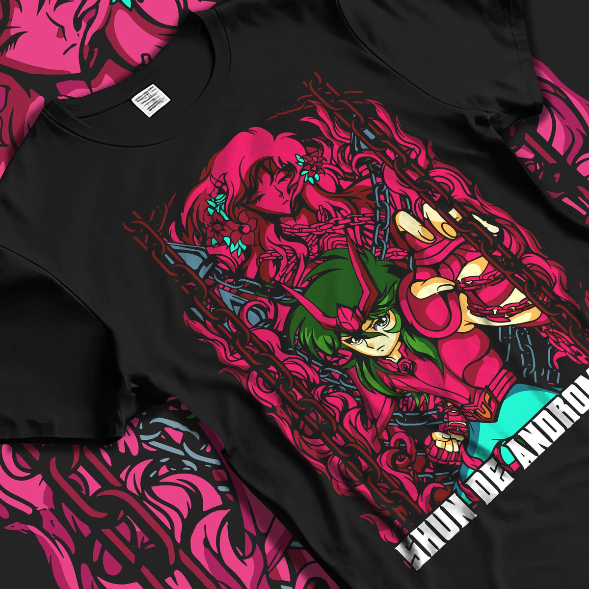 Black T-shirt laid flat with natural folds featuring Shun of Andromeda Nebula Chain artwork.