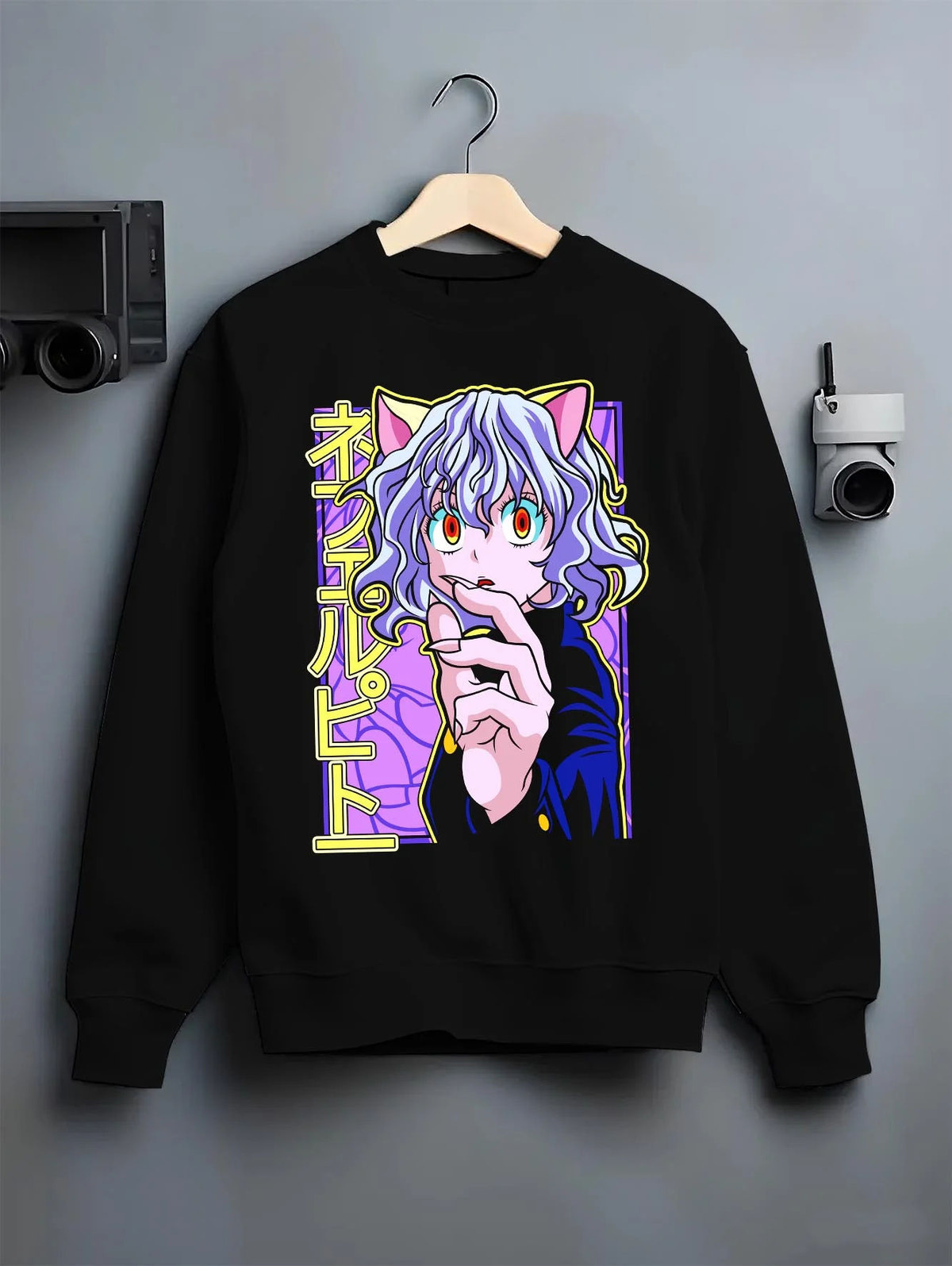 Black crewneck sweatshirt on hanger featuring Neferpitou Chimera Ant Nen power artwork.