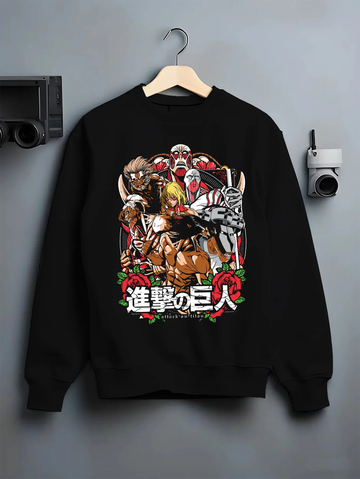 Black crewneck sweatshirt on hanger showing Attack on Titan: Corps and Titans ensemble