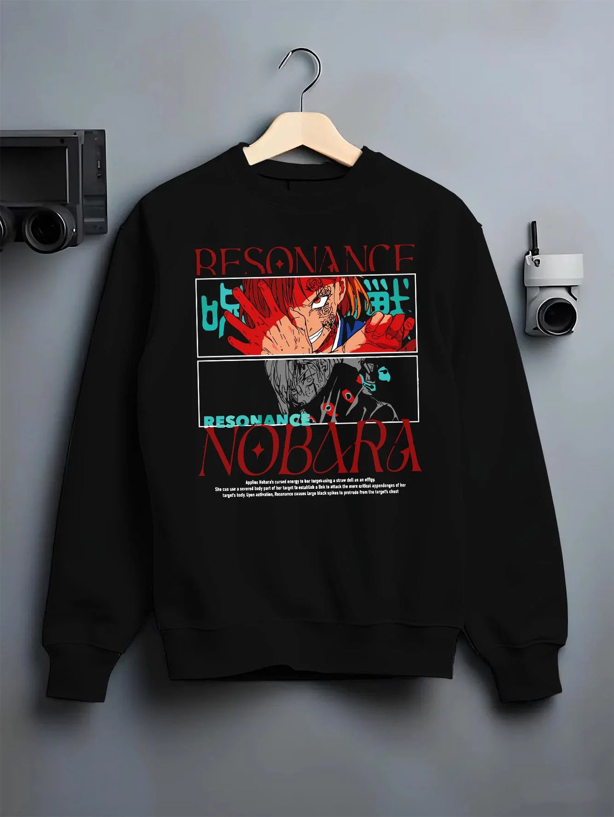 Black crewneck sweatshirt on hanger featuring Nobara Kugisaki Resonance technique artwork.