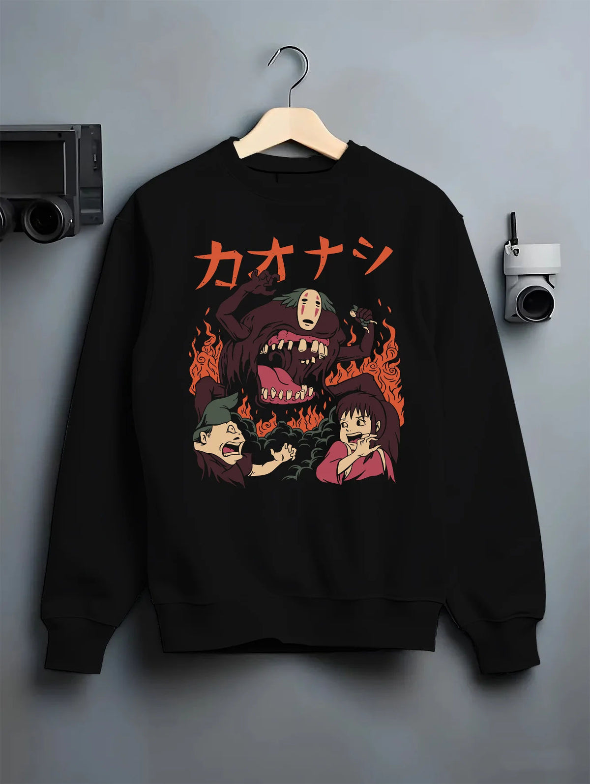 Black crewneck sweatshirt on hanger with No-Face / Kaonashi and Spirited Away cast illustrated back graphic