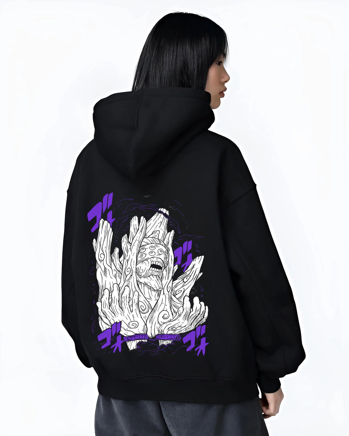 Black hoodie worn by female model from the back featuring Obito Uchiha White Zetsu mask form Naruto artwork.