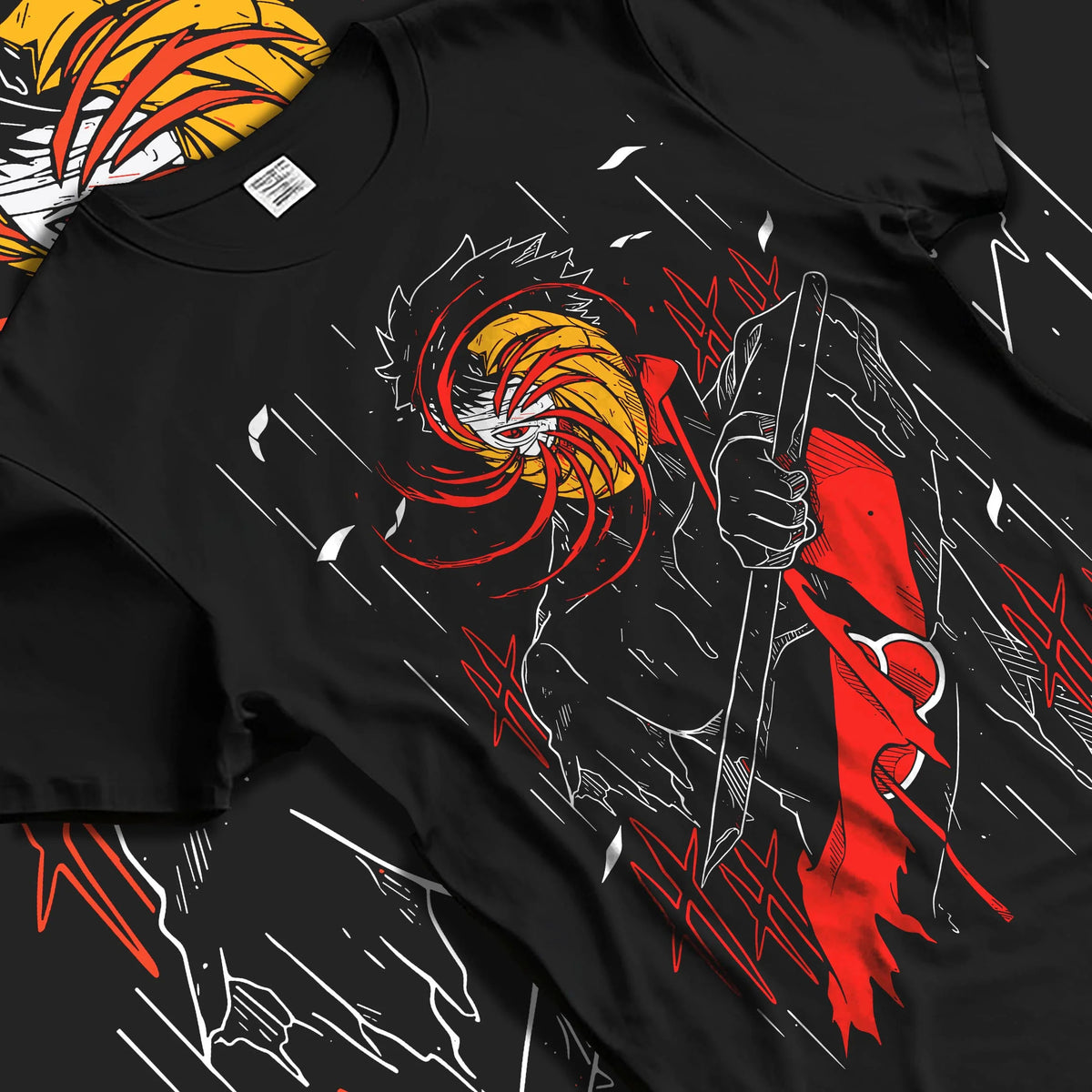 Black T-shirt laid flat with natural folds featuring Obito Uchiha Akatsuki spiral mask Naruto artwork.