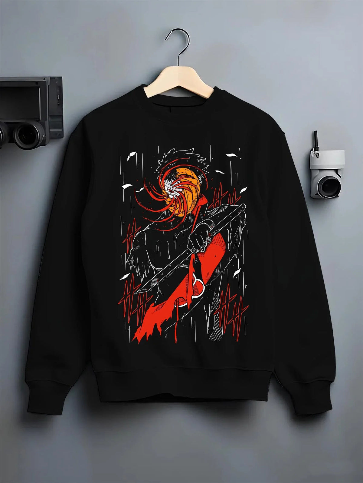 Black crewneck sweatshirt on hanger featuring Obito Uchiha Akatsuki spiral mask Naruto artwork.