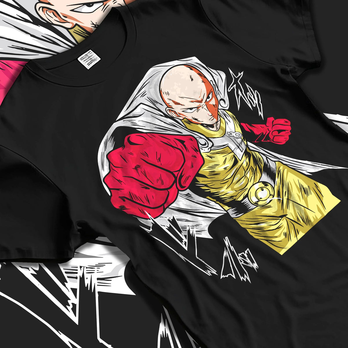 Black T-shirt laid flat with natural folds featuring Saitama serious hero One Punch Man artwork.