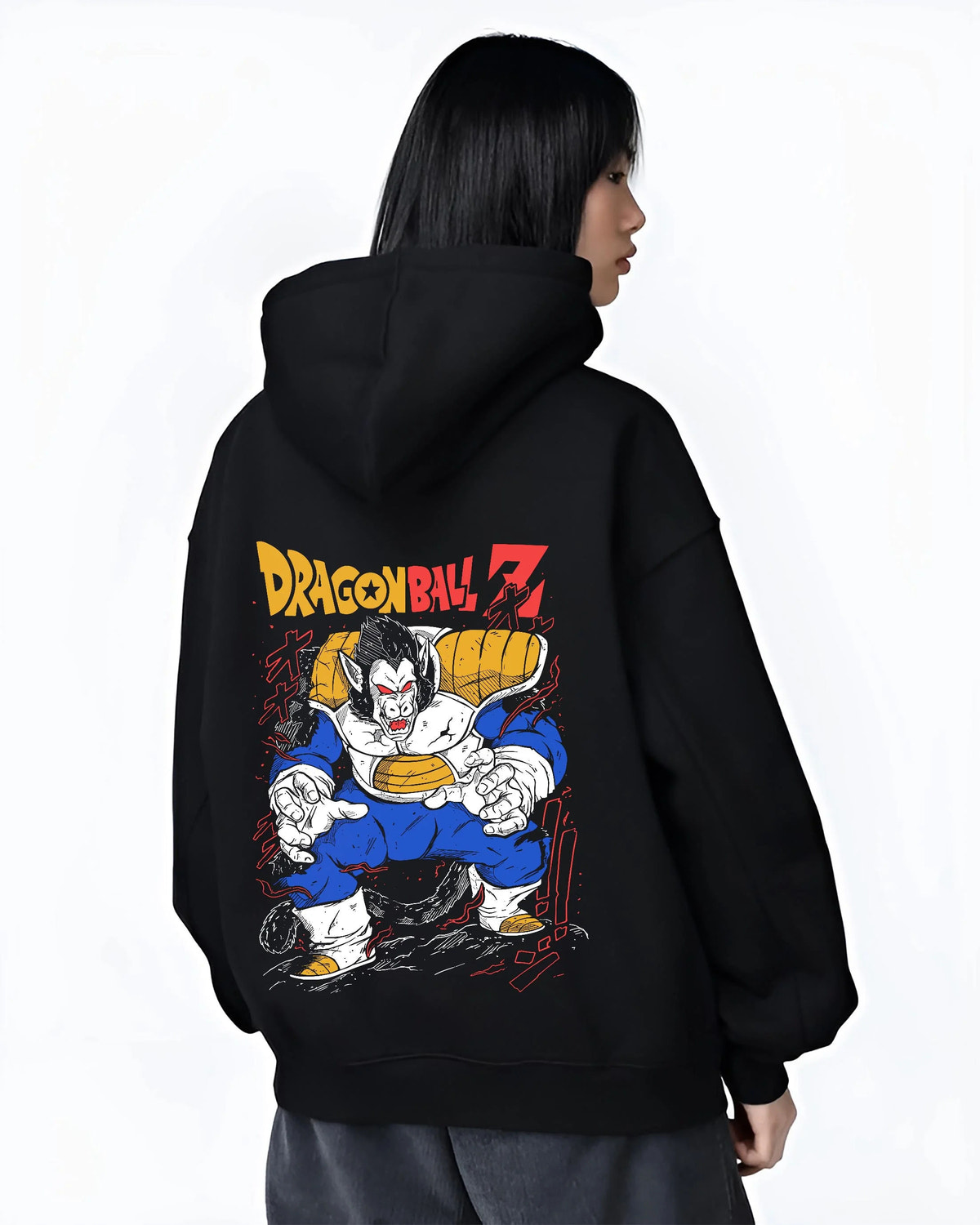 Black hoodie worn by female model from the back featuring Vegeta Great Ape Oozaru form Dragon Ball Z artwork.