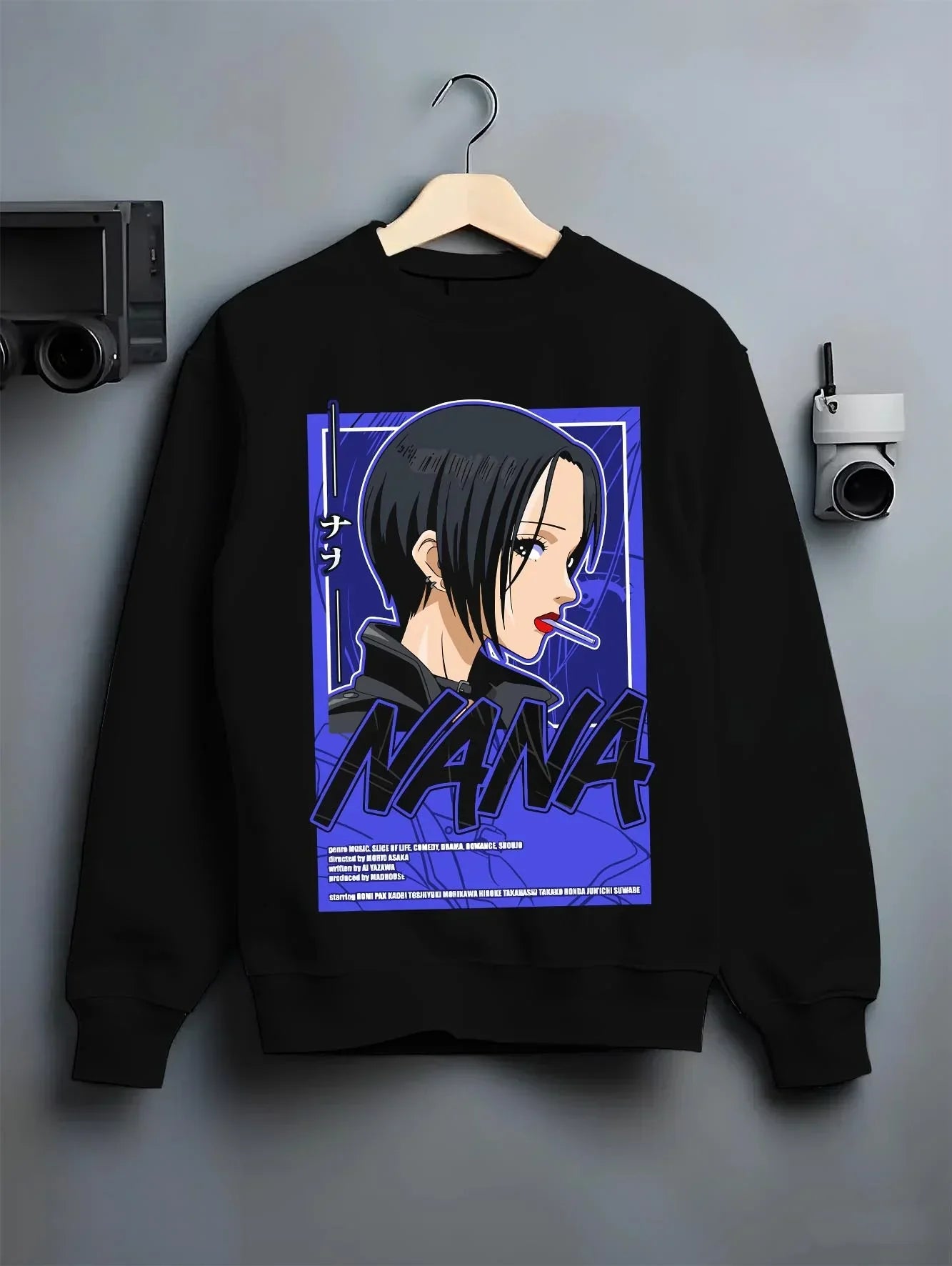 Black crewneck sweatshirt on hanger with Osaragi Hoodie Oshi no Ko School Uniform graphic bold anime graphic.