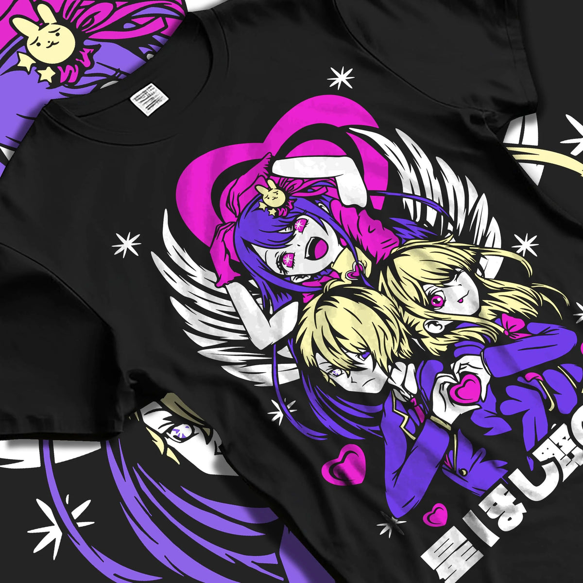Black T-shirt laid flat with natural folds featuring Ai Hoshino with Ruby and Aqua Oshi no Ko artwork.