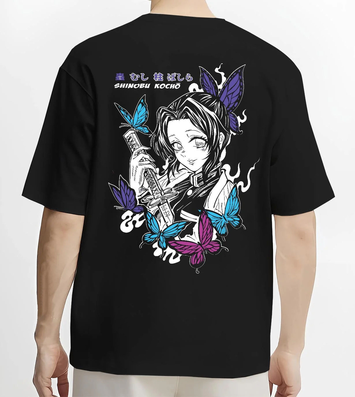Black T-shirt worn by male model from the back featuring Shinobu Kocho butterfly poison Demon Slayer artwork.