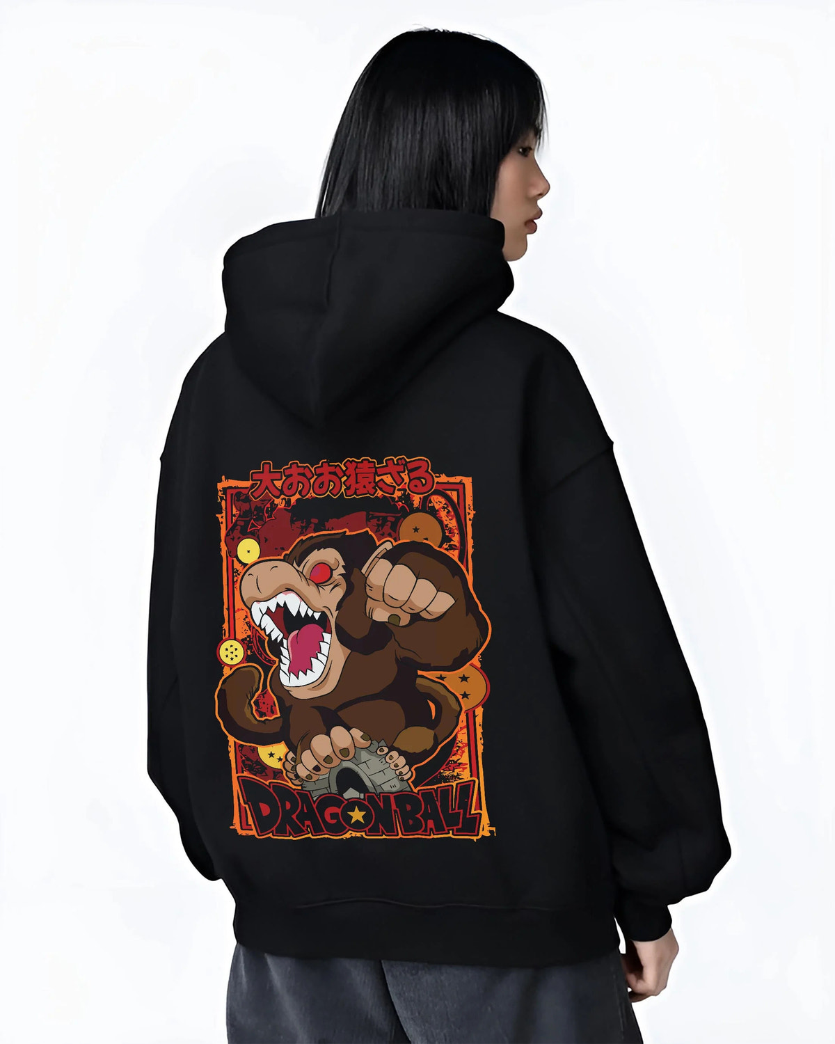 Black hoodie worn by female model from the back featuring Kid Goku Great Ape transformation Dragon Ball artwork.