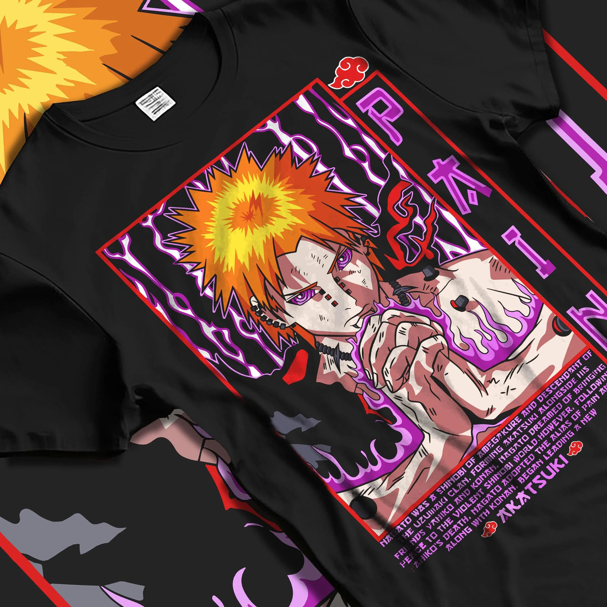 Black T-shirt laid flat with natural folds featuring Pain Rinnegan Six Paths portrait Naruto artwork.