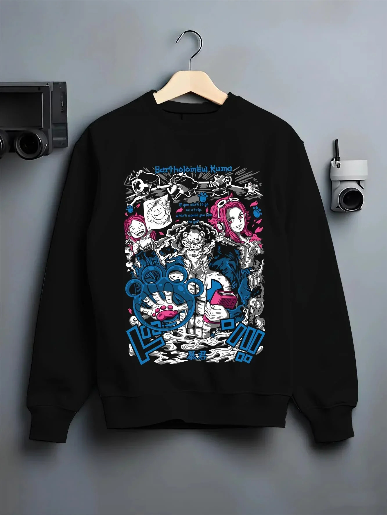 Black crewneck sweatshirt on hanger with Bartholomew Kuma Hoodie One Piece Warlord graphic premium wear.